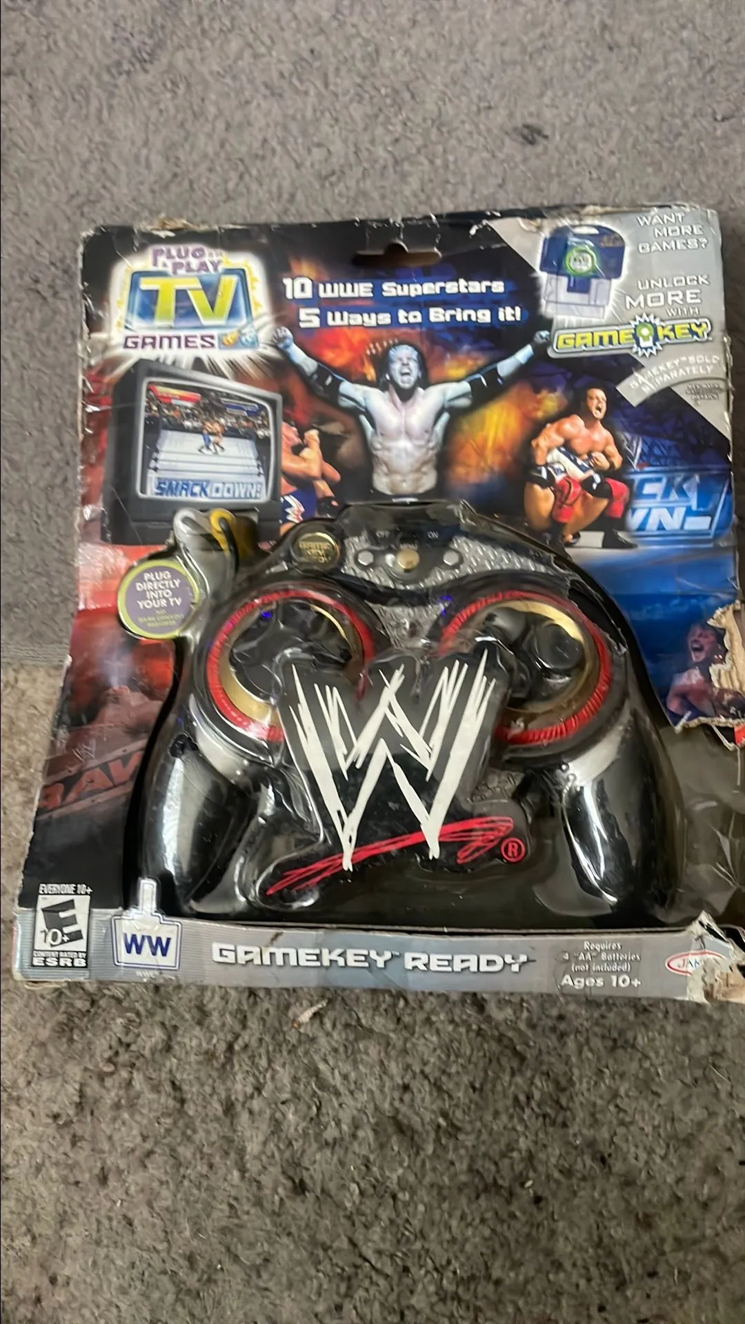 Product image for Raw versus SmackDown plug and play game boxes in OK condition looks to never been opened obo