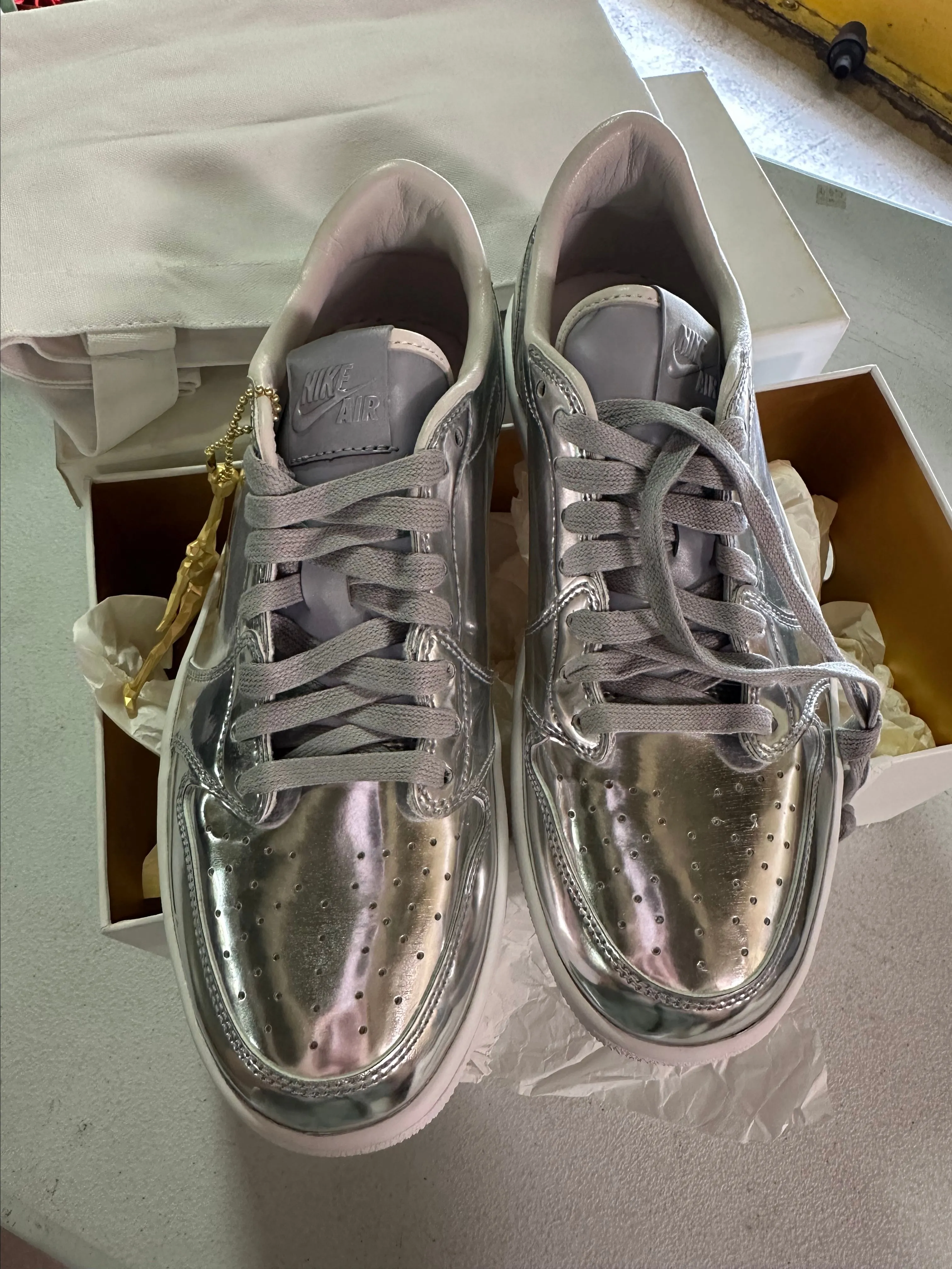 Product image for (52) Jordan 1 Retro Low Pinnacle Metallic Silver box damaged Size 8.5