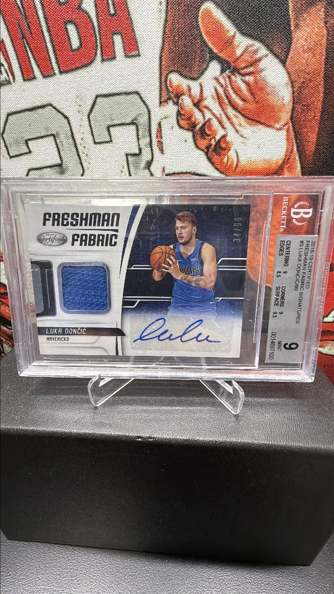 Product image for Luka Doncic freshman fabric rookie patch auto 34/99 Beckett 9