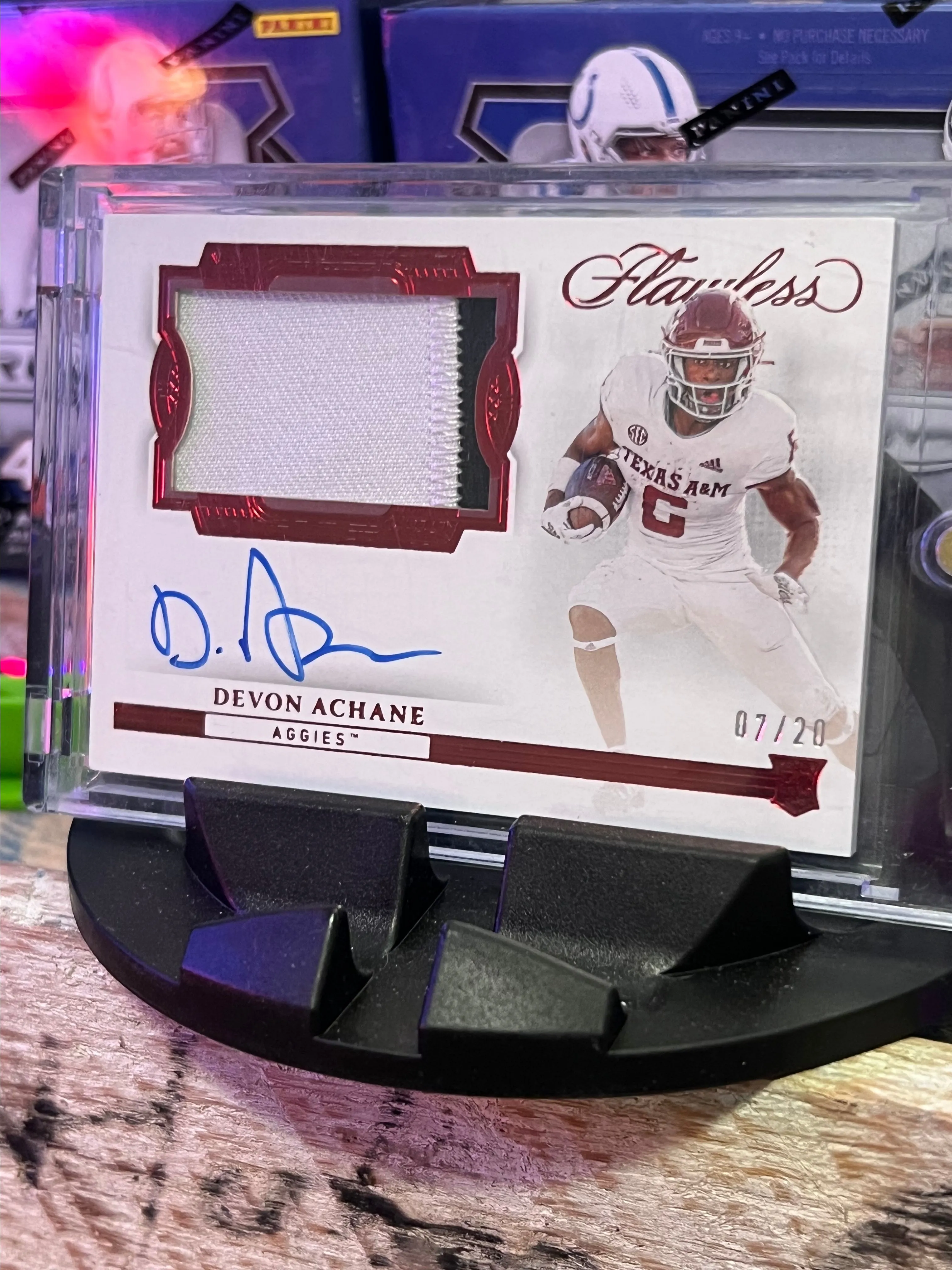 Product image for Devon Achane 2023 Panini Flawless Collegiate Ruby Patch Auto # /20
