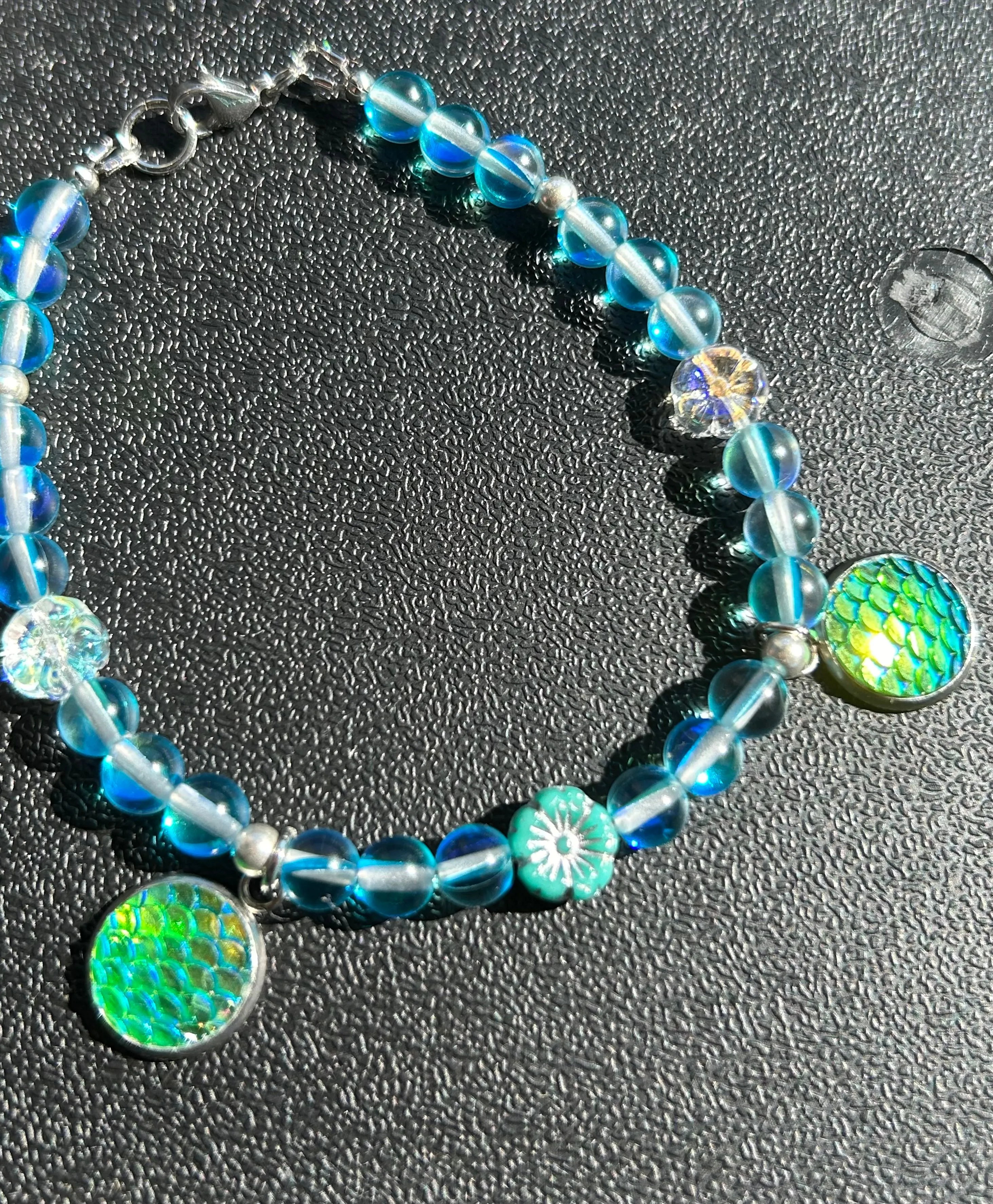Product image for Blue mermaid glass and mermaid scale bracelet