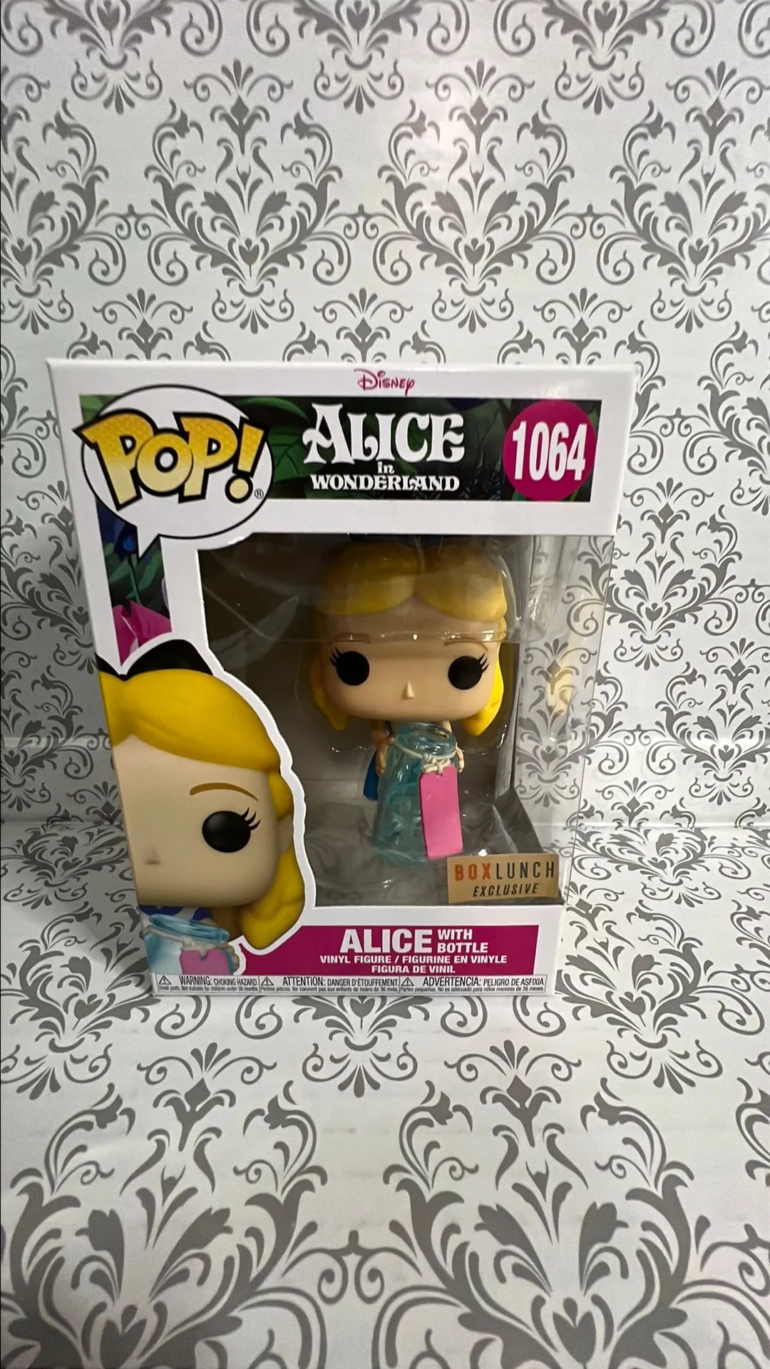 Product image for Alice with bottle