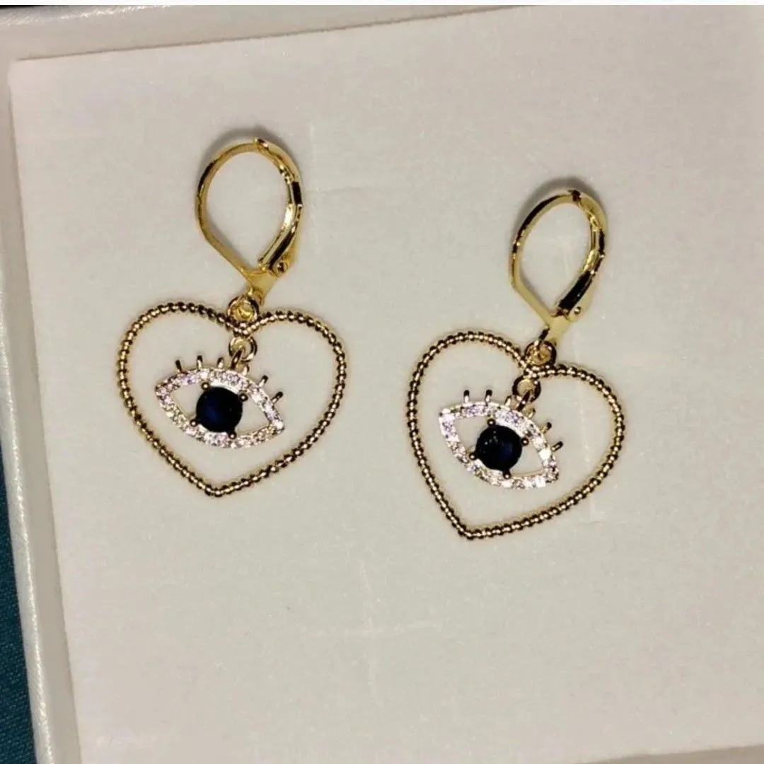 Product image for 12. cute gold tone heart eye earrings 