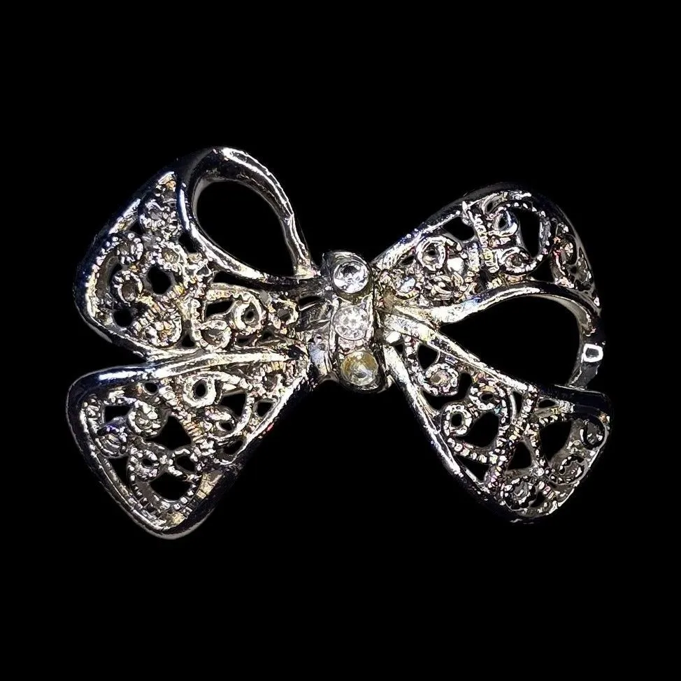 Product image for 011 Contemporary 1 1/2" Silvertone Bow Brooch