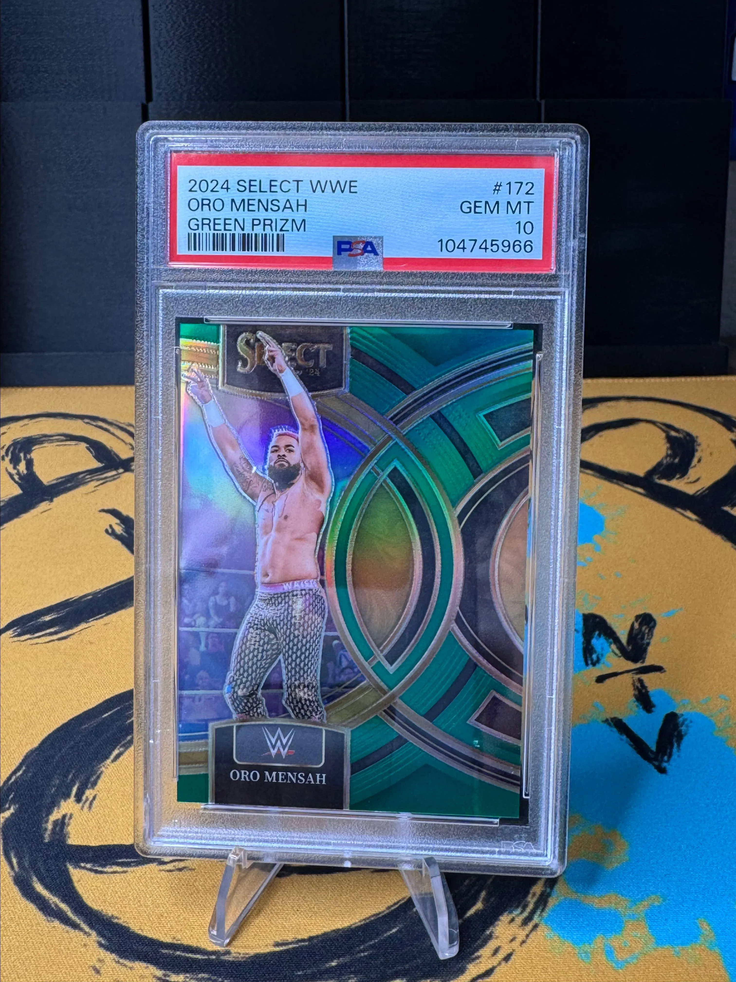 Product image for WWE 2024 Select Oro Mensah Green 5/5 PSA 10