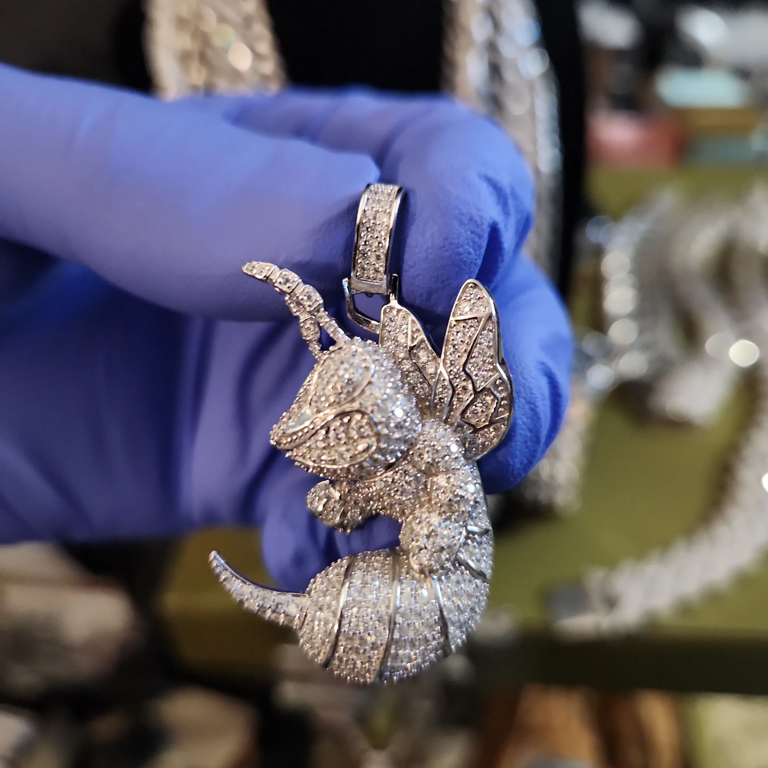 Product image for .925 Silver and iced out w/cz Hornet pendant