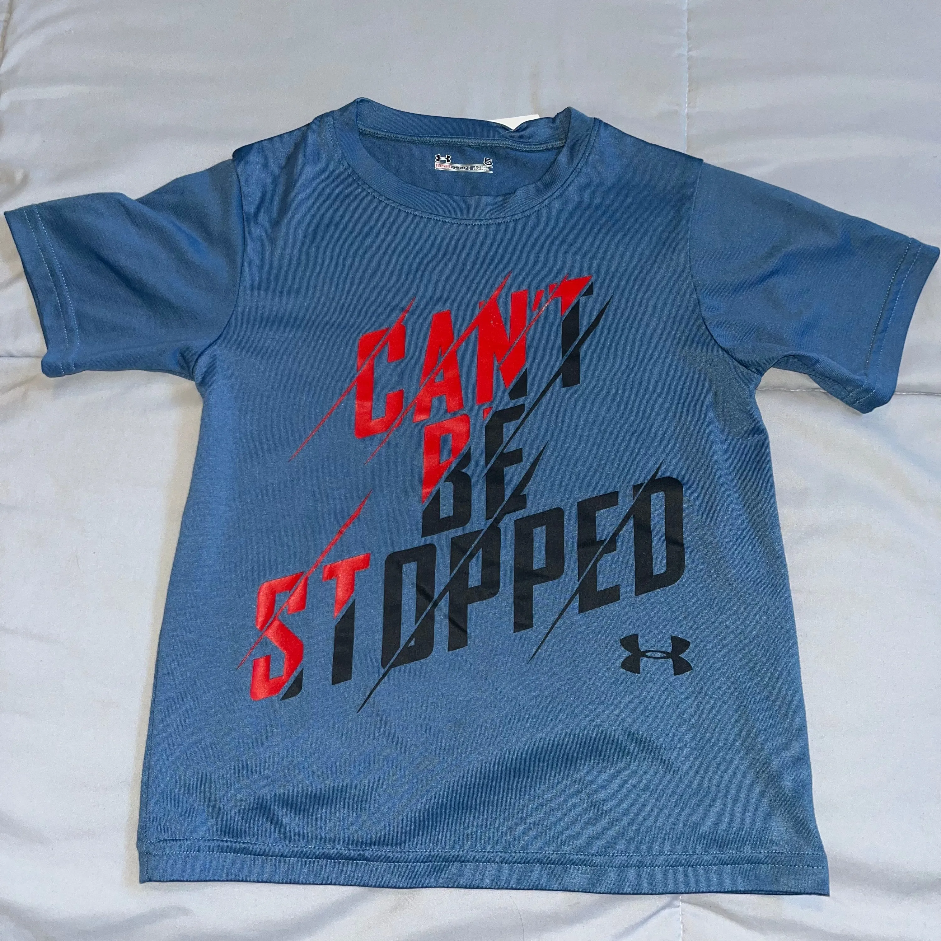 Product image for 138. Under Armour “Can’t Be Stopped” blue heat gear shirt, size 5