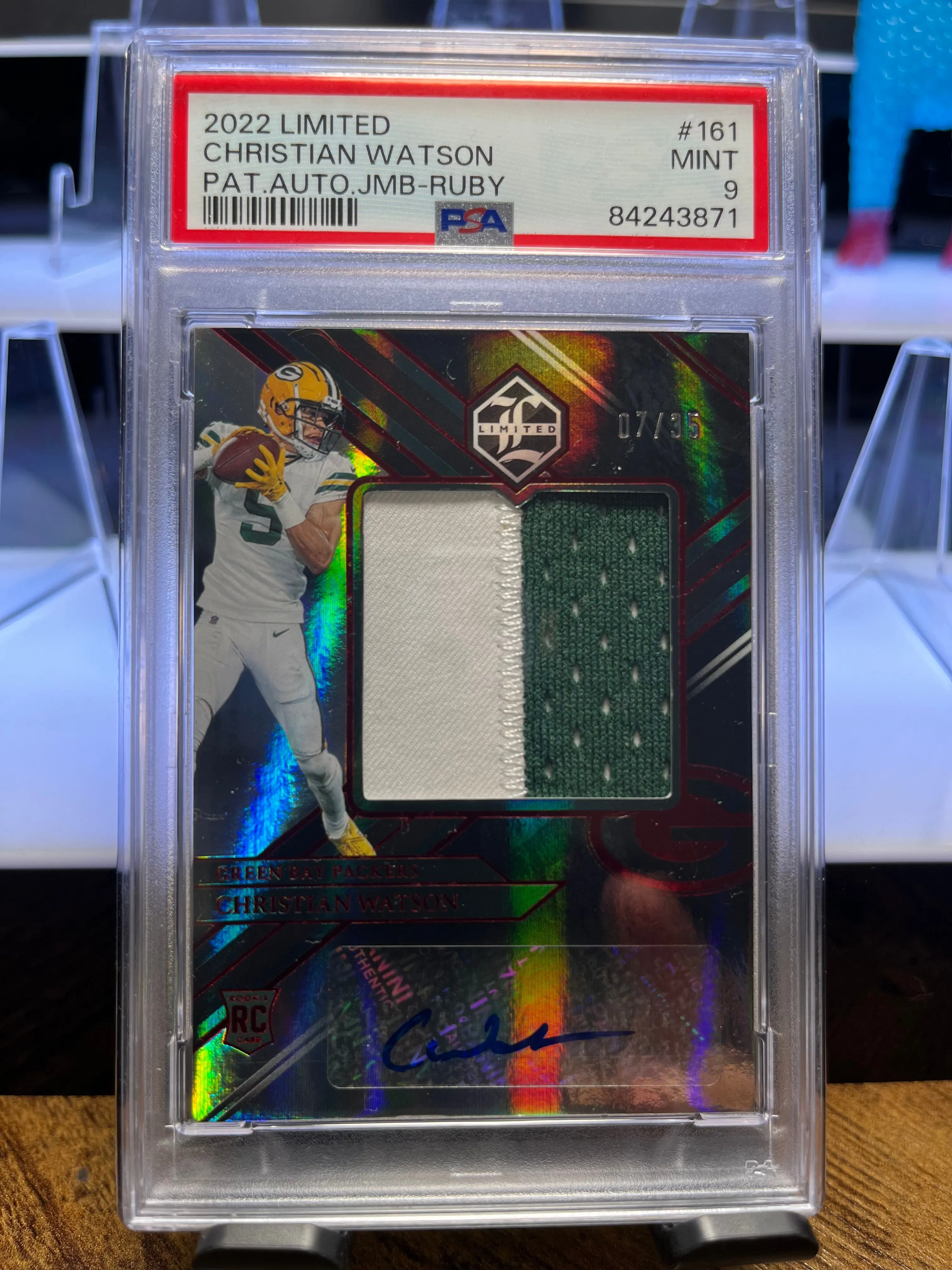 Product image for Christian Watson Limited Rookie Card Patch Auto PSA 9 07/35