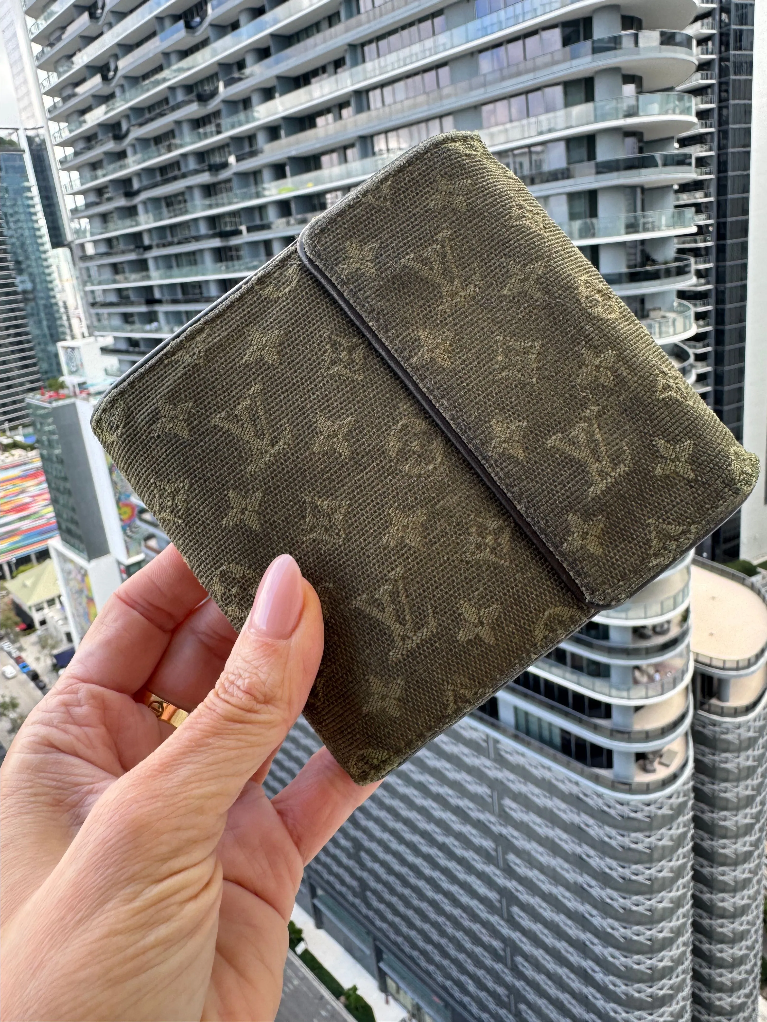 Product image for 52. Louis Vuitton Monogram Mini Lin Wallet in Green