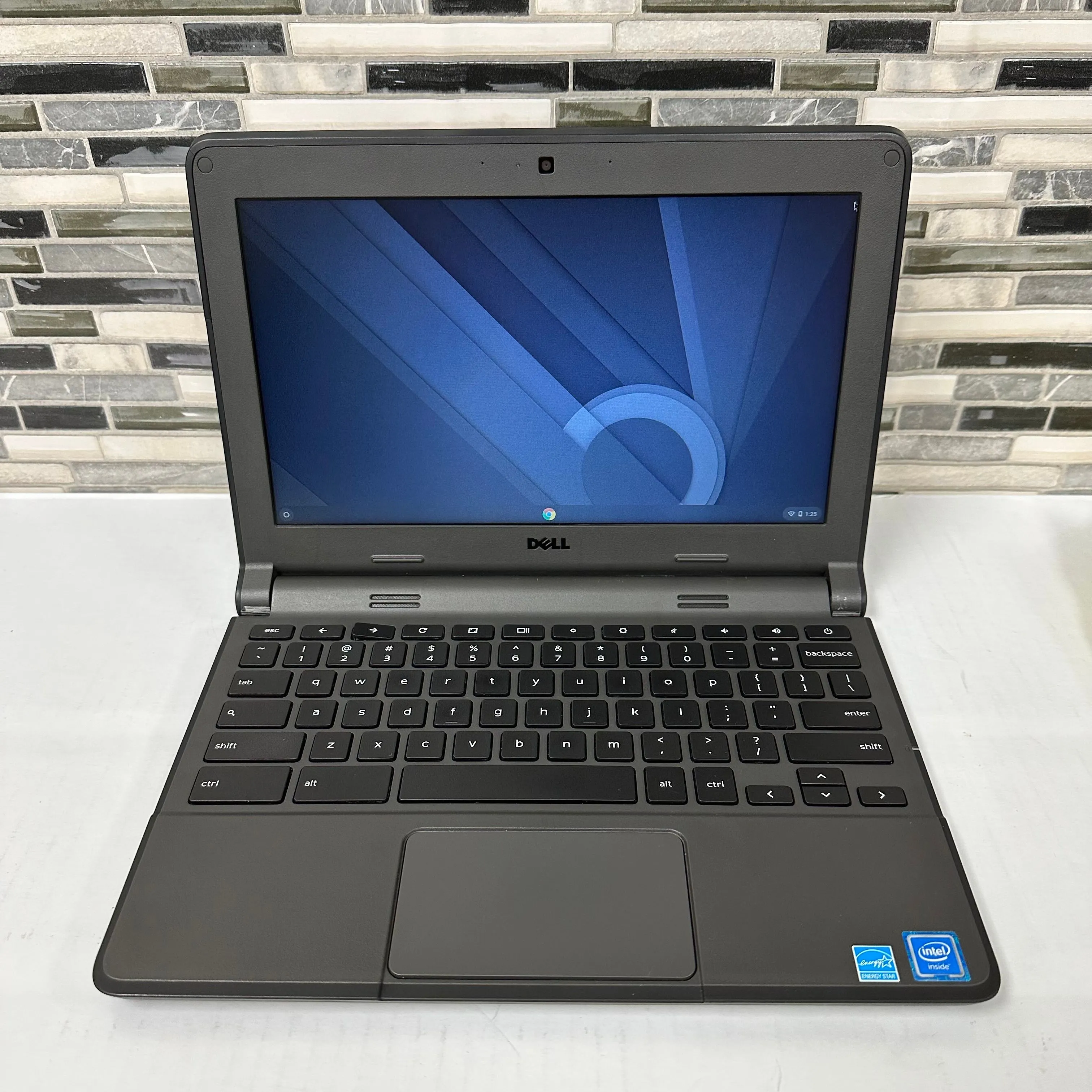 Product image for Dell 3120 Chromebooks with charger.