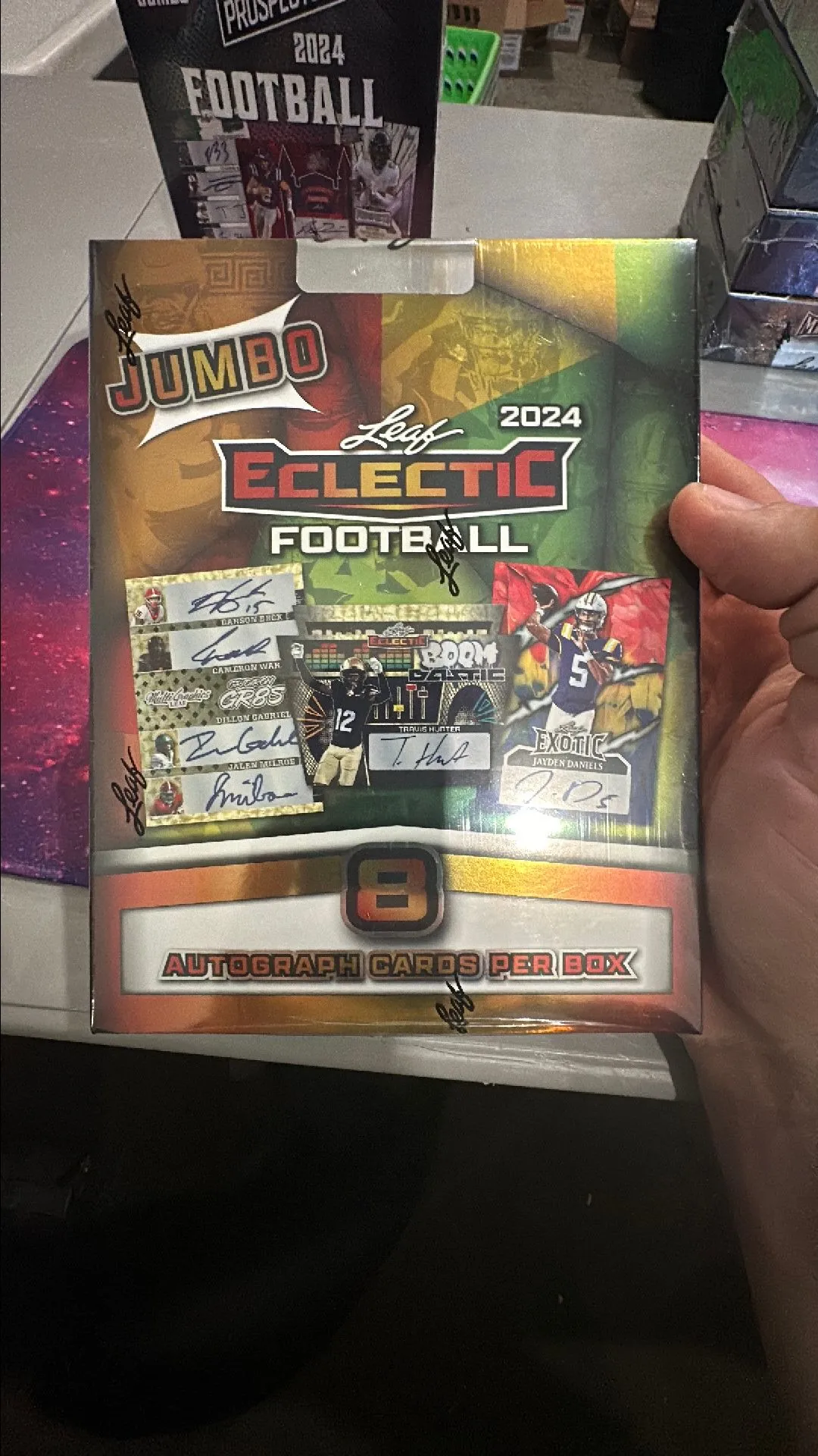 Product image for ( 1 ) 2024 Leaf Eclectic Football JUMBO Hobby Box 8 autographed per box