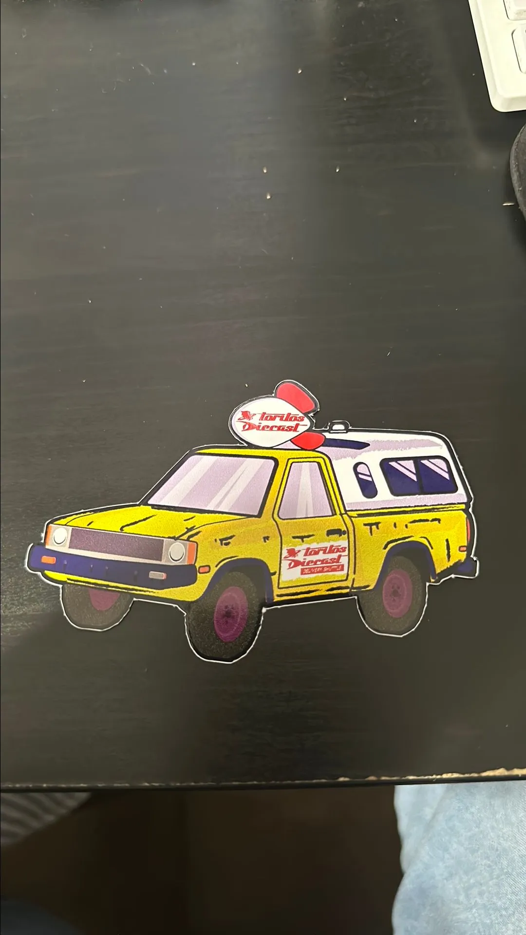 Product image for Pizza planet toritos diecast sticker.