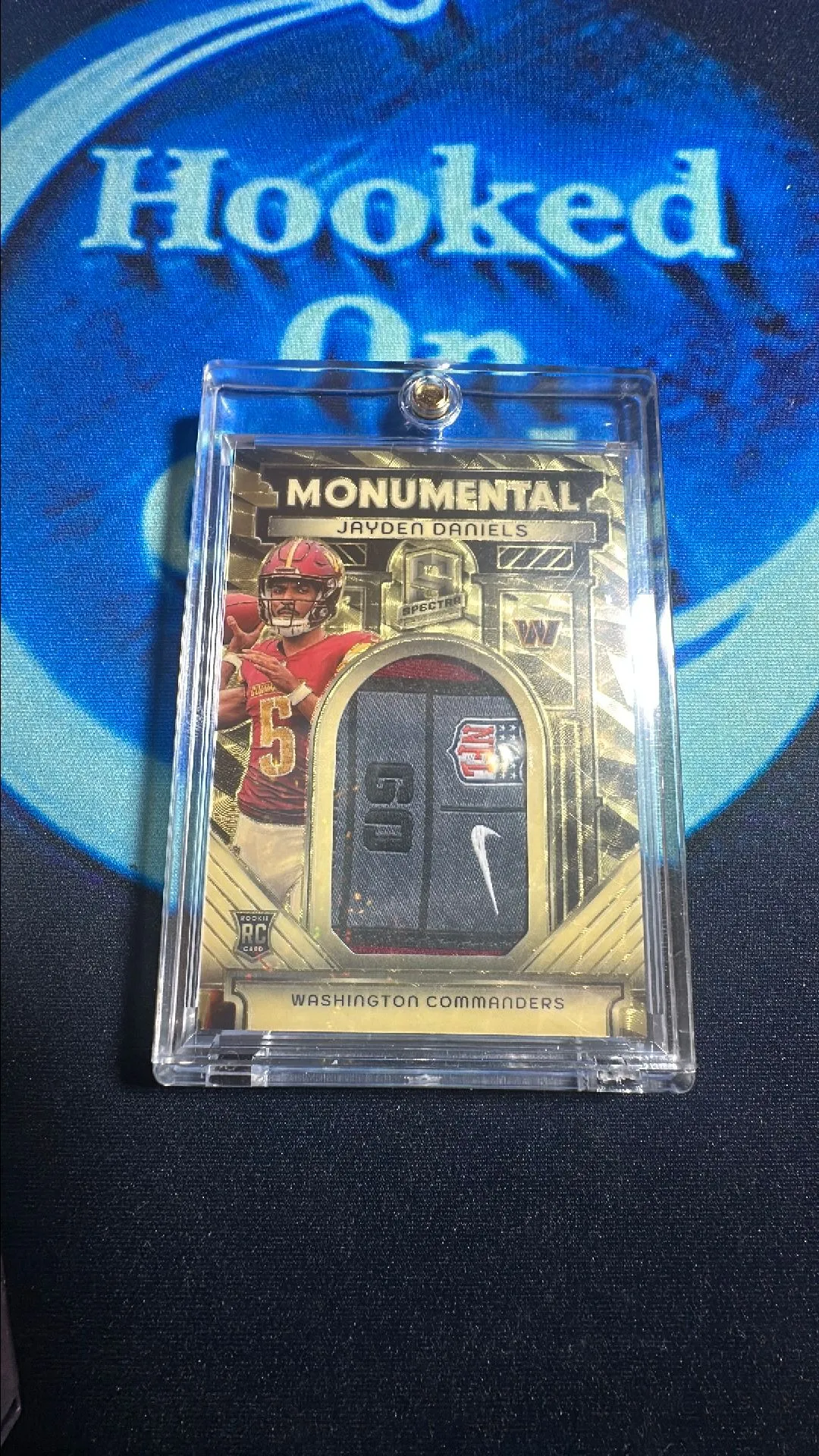 Product image for Jayden Daniels GOLD VINYL 1/1 NFL Swoosh Shield Players Tag RPA RC Rookie