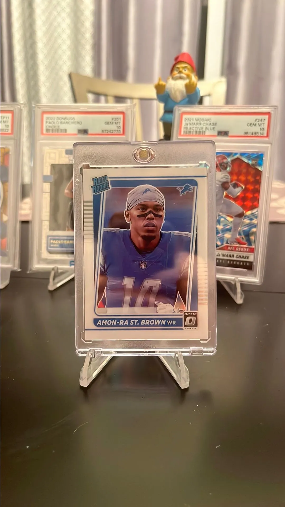 Product image for 2021 Optic Silver Prizm Amon-Ra St. Brown Image Variation SP