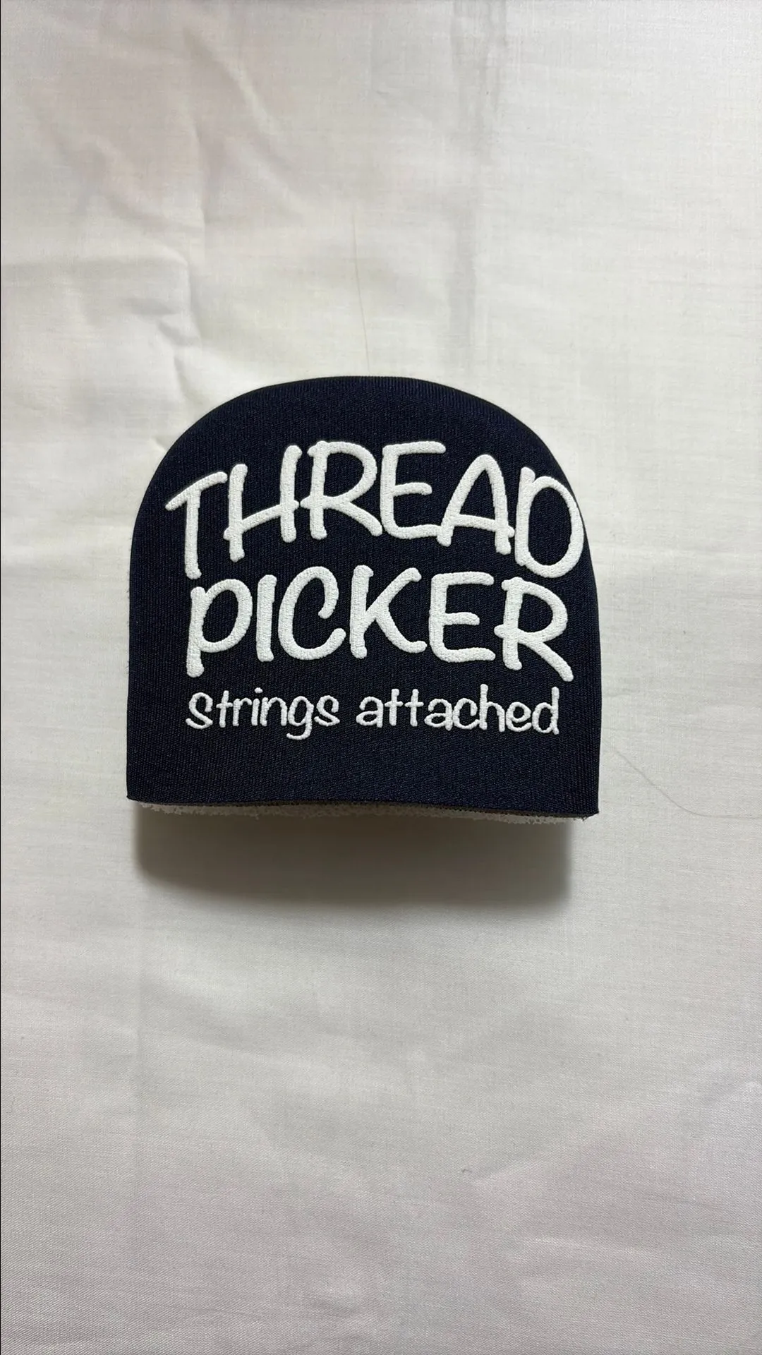 Product image for 0Btp Thread Picker mitt for brushing off loose threads from fabric