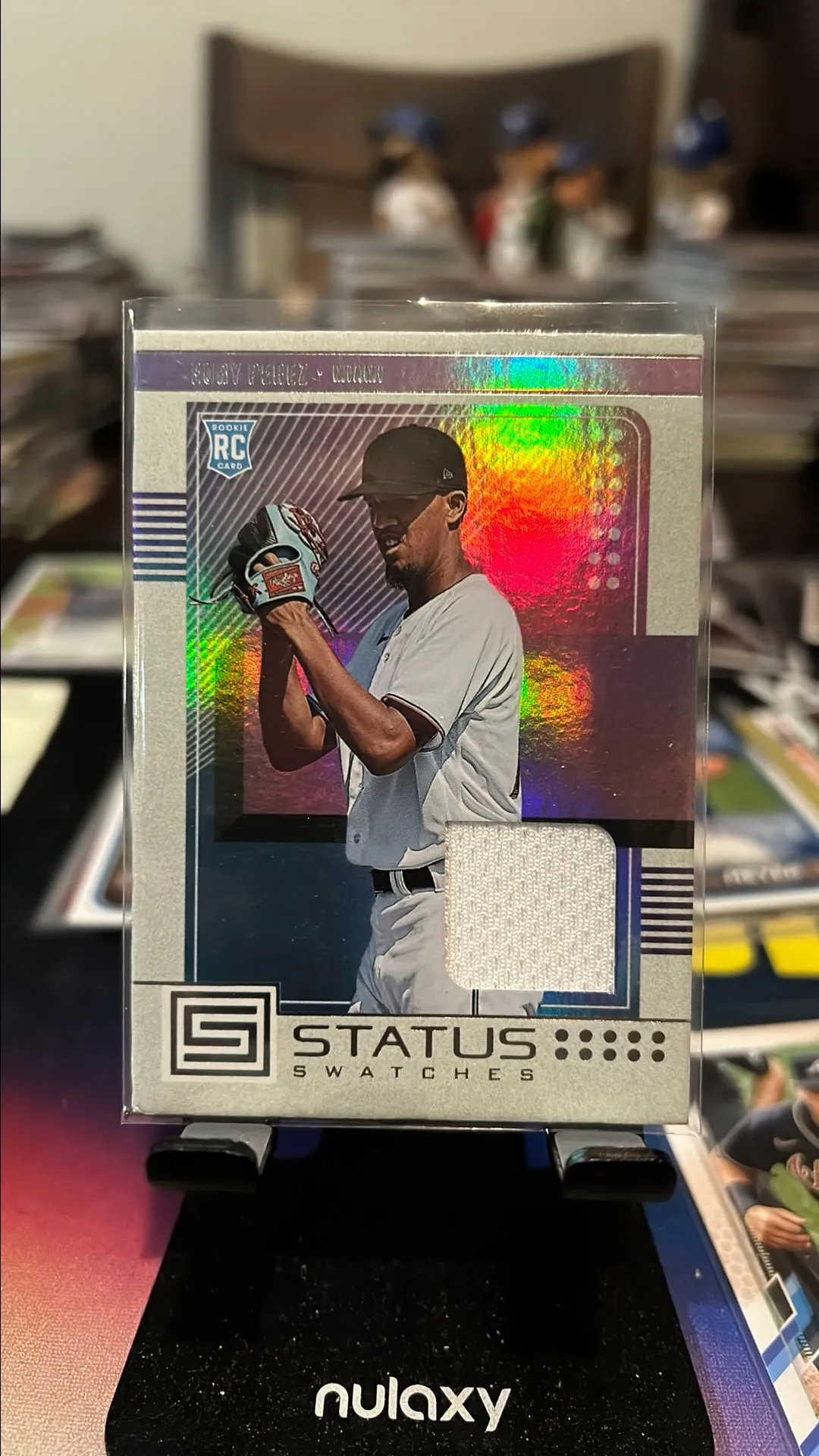 Product image for Eury Perez 2023 Chronicles Status Swatches Rookie Card #SS-EP RC Miami Marlins
