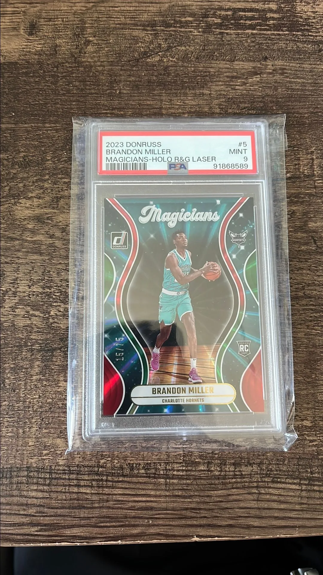 Product image for 2023 Panini Donruss Magicians Brandon Miller 5 Magicians-Holo R&G Laser PSA MINT 9    73