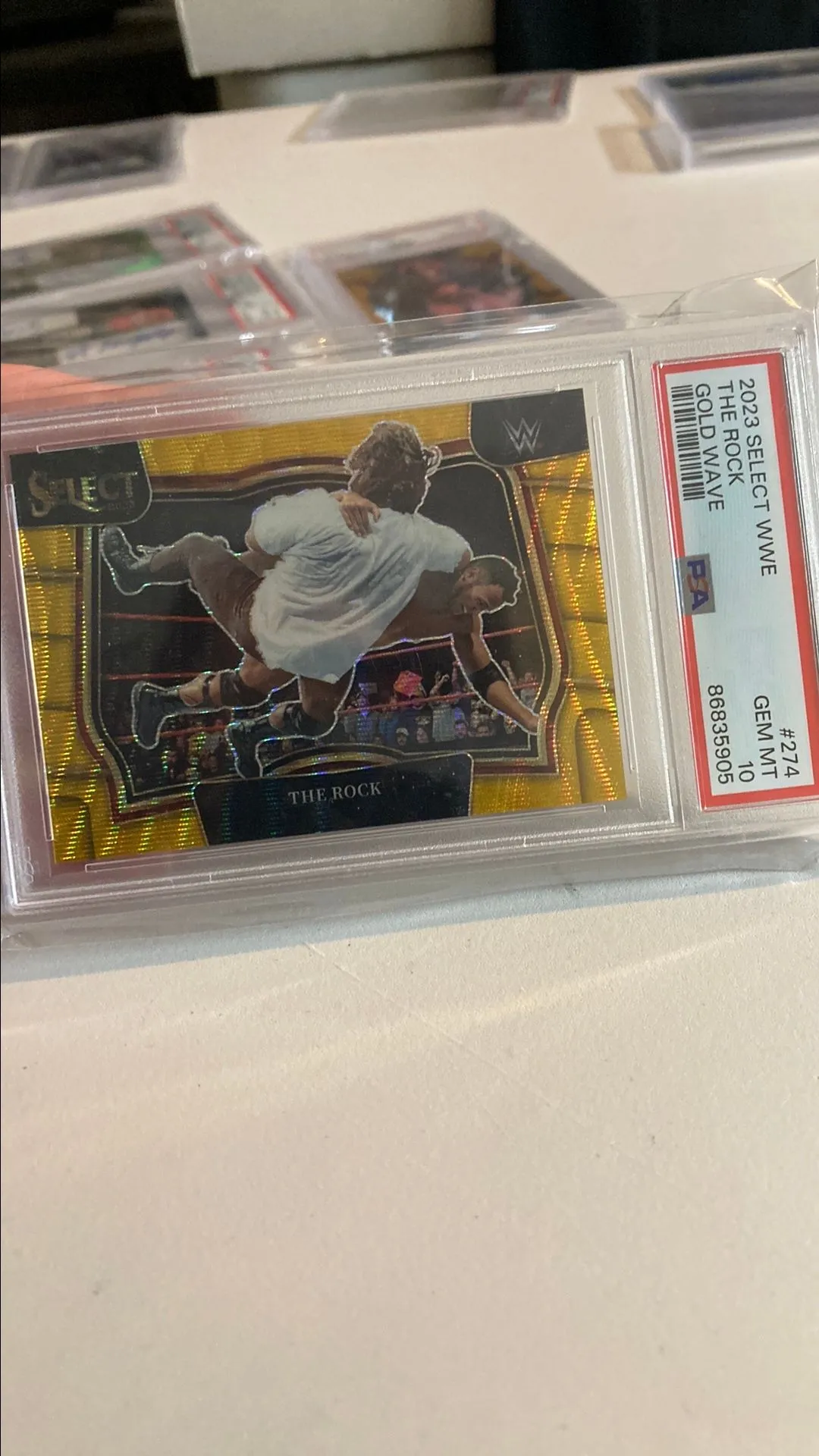Product image for 2023 Panini Select Wwe The Rock Gold Wave PSA GEM MT 10