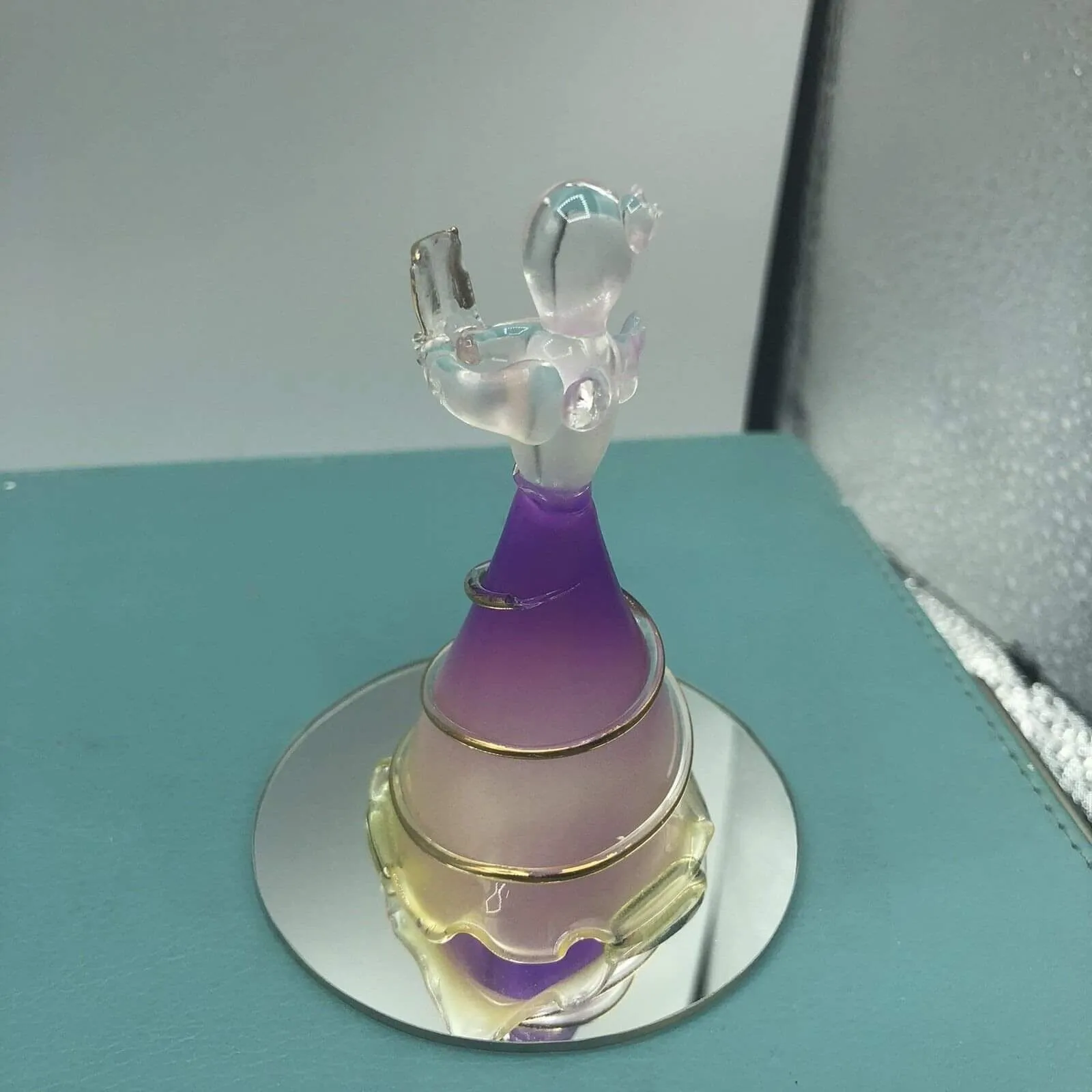 Product image for Spun glass angel on mirror vase