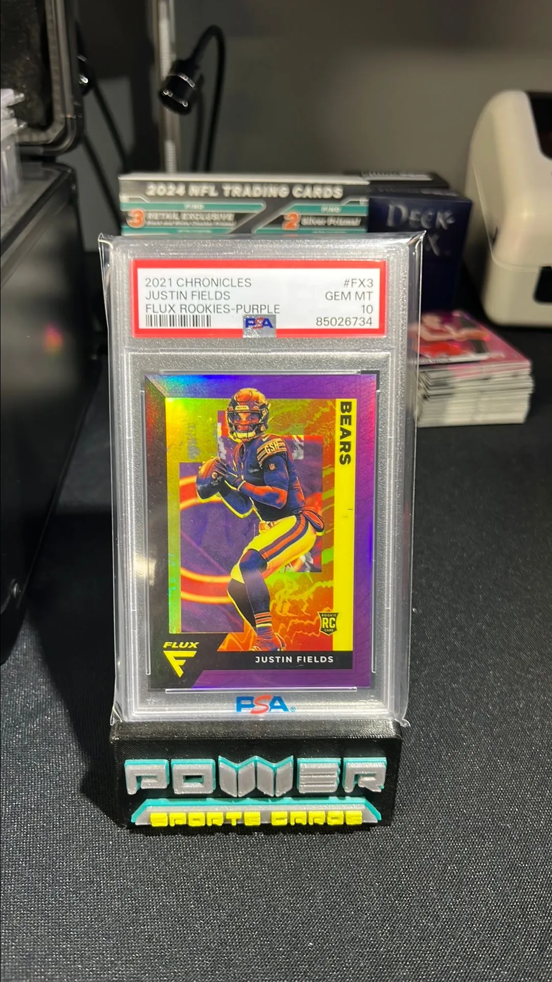 Product image for 2021 Panini Chronicles Flux Rookies Justin Fields FX3 Flux Rookies-Purple /199 PSA GEM MT 10