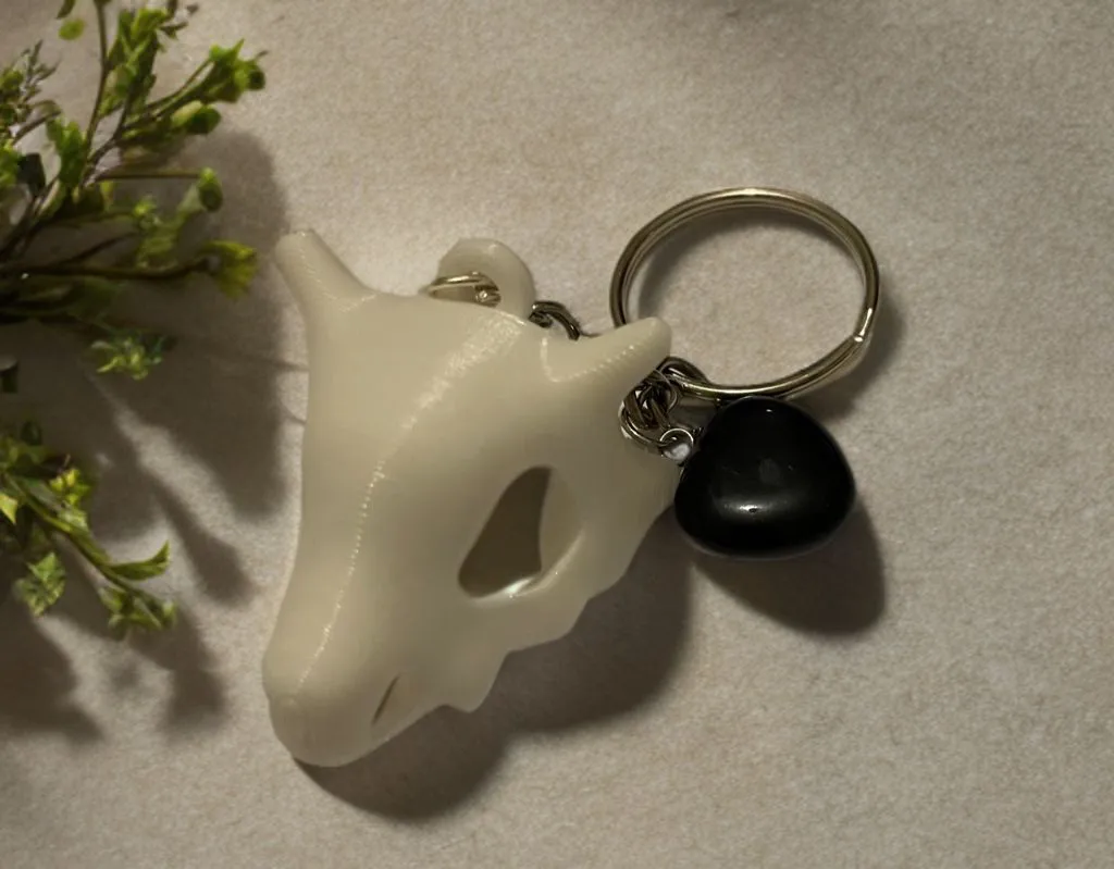 Product image for 3D printed Cubone skull  keyring with onyx black heart