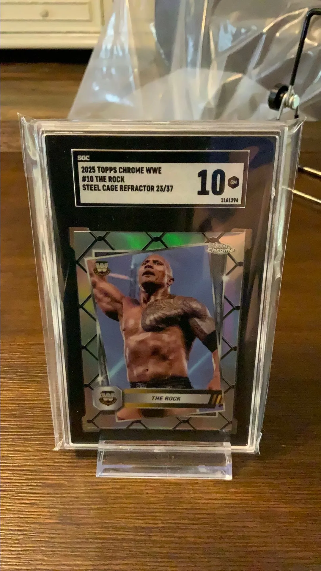Product image for 2025 Topps Chrome Wwe The Rock SGC Steel Cage Refractor 10