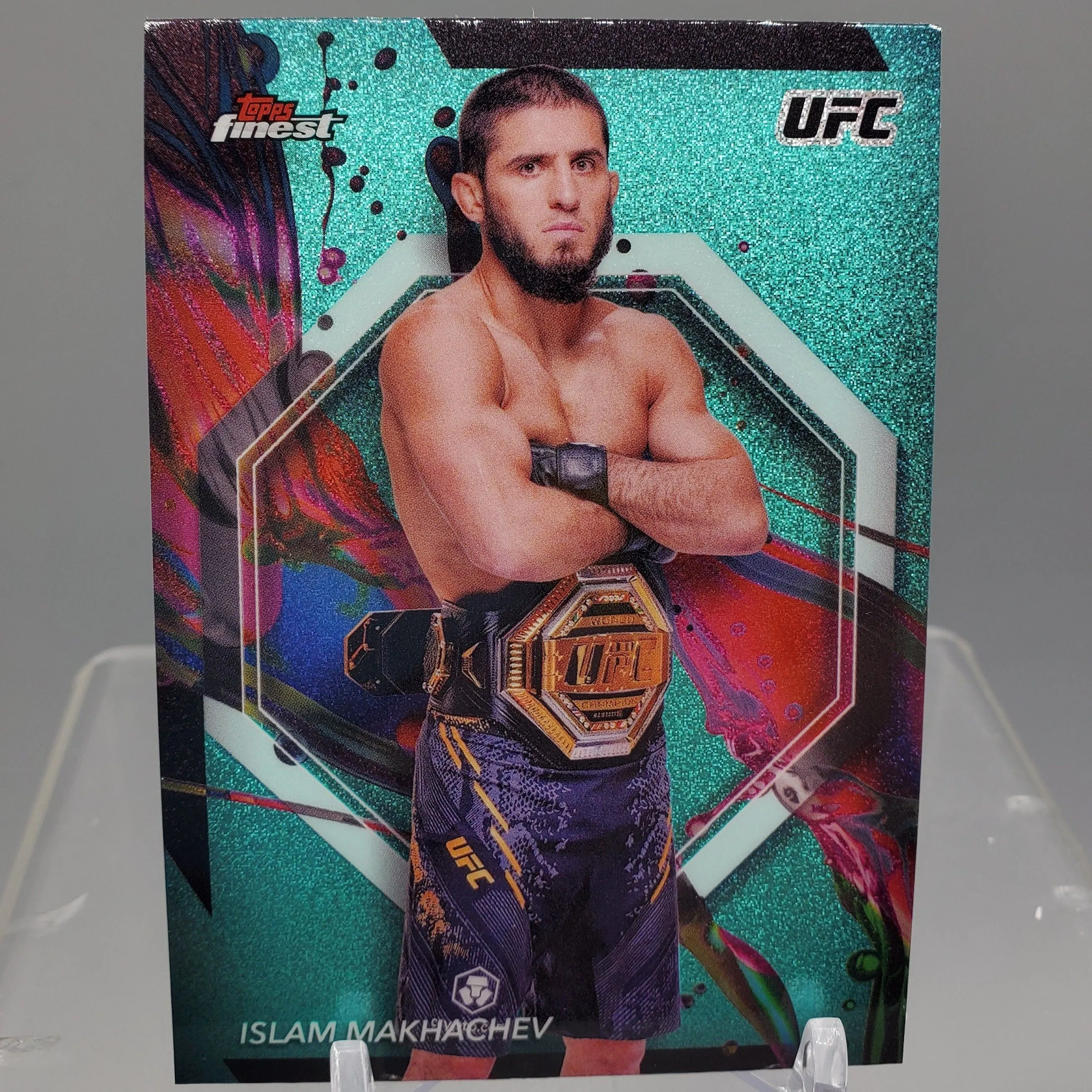 Product image for 2024 Topps Finest UFC #63 Islam Makhachev Aqua Glitter Parallel Card
