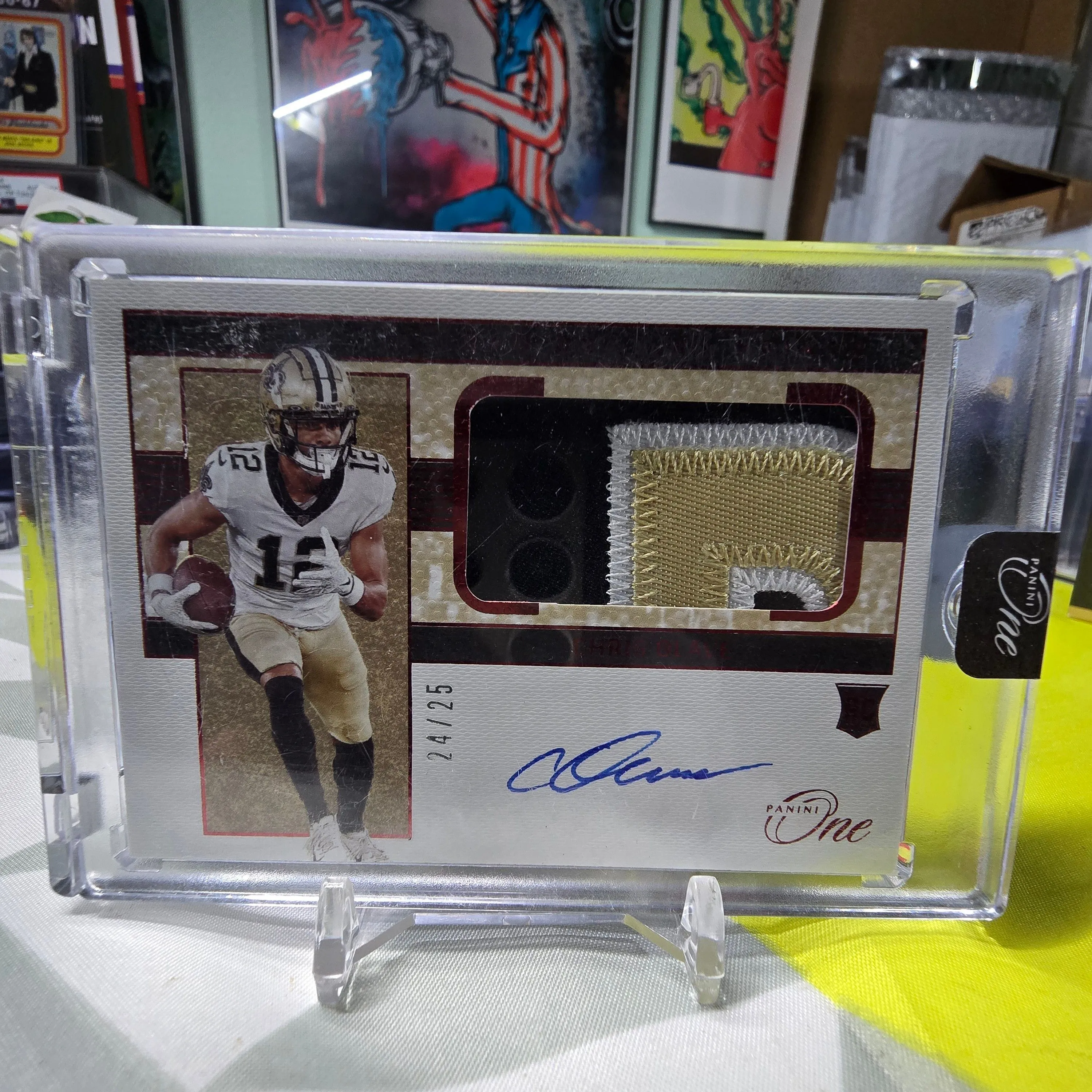 Product image for 2022 Panini One Chris Olave /25 Rookie Patch Auto On Card #6 New Orleans Saints OSU Buckeyes