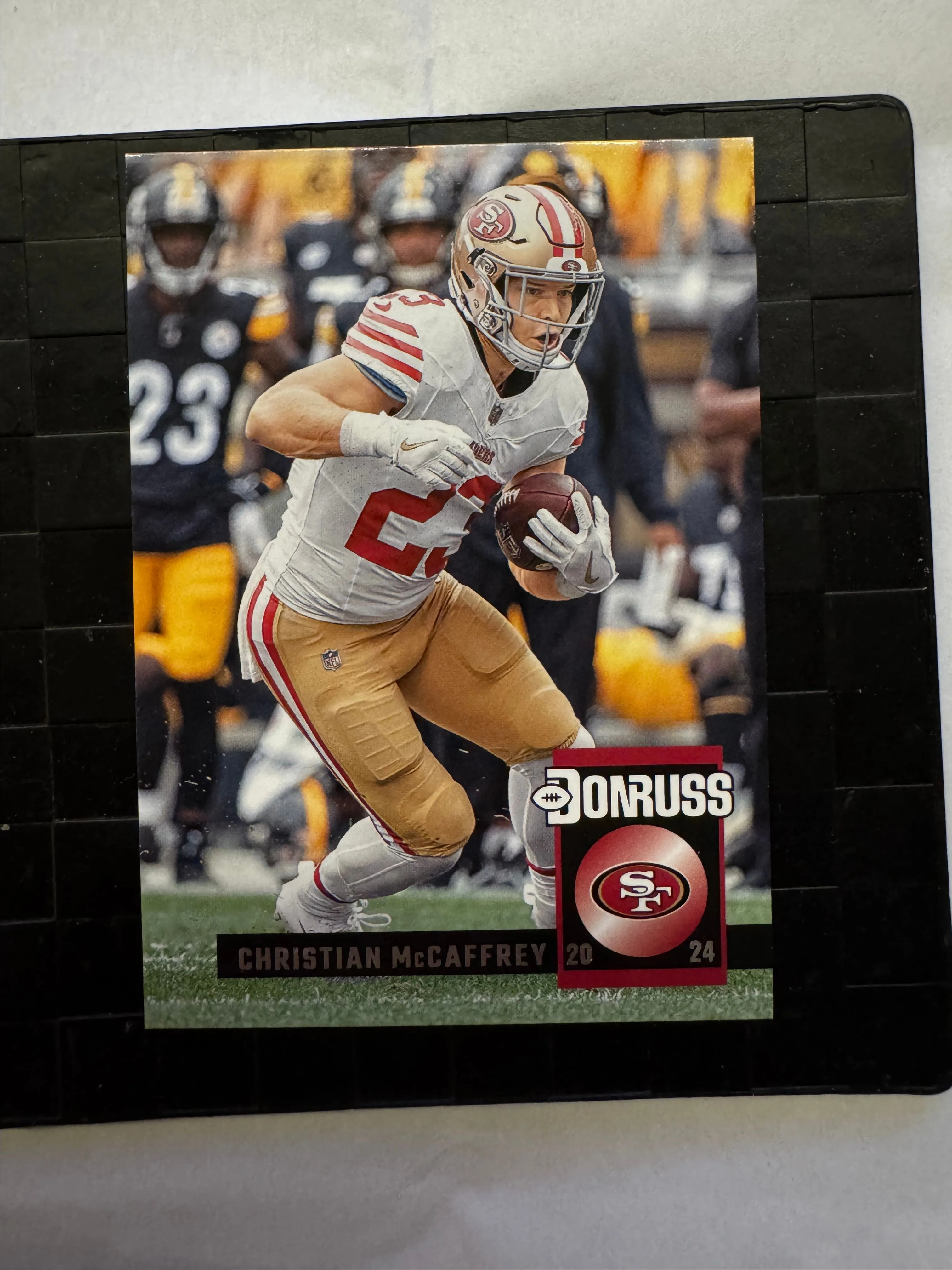 Product image for 2024 Panini Donruss Retro Christian McCaffrey San Francisco 49ers
