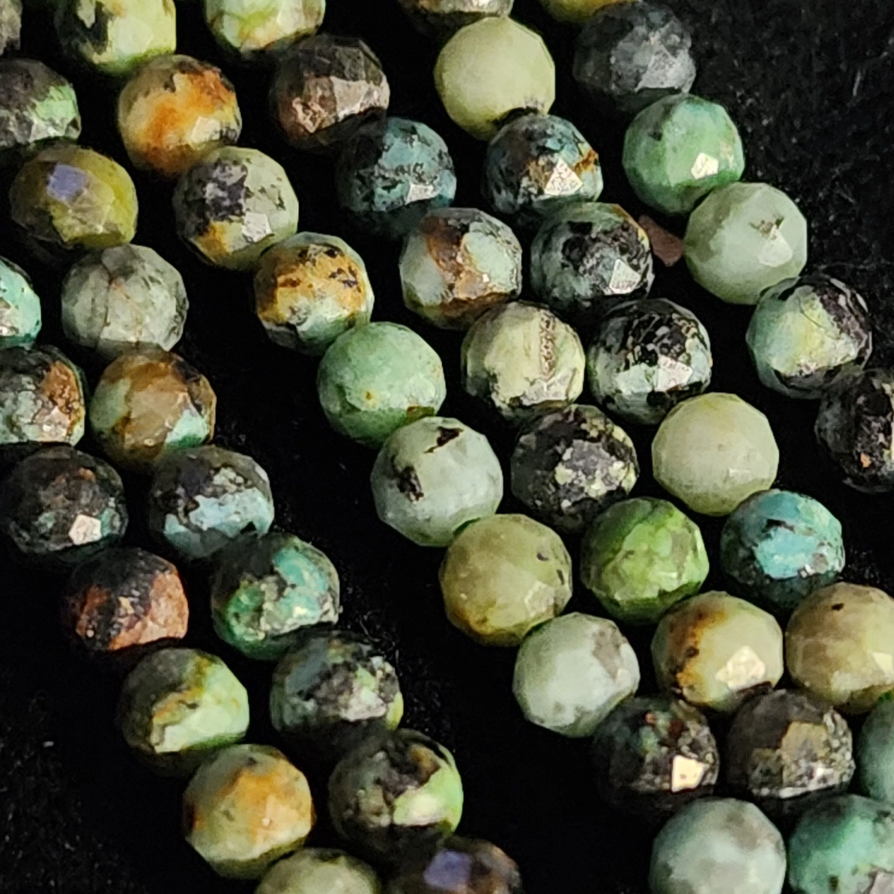 Product image for #24L: African Turquoise Faceted Round Beads, 3mm