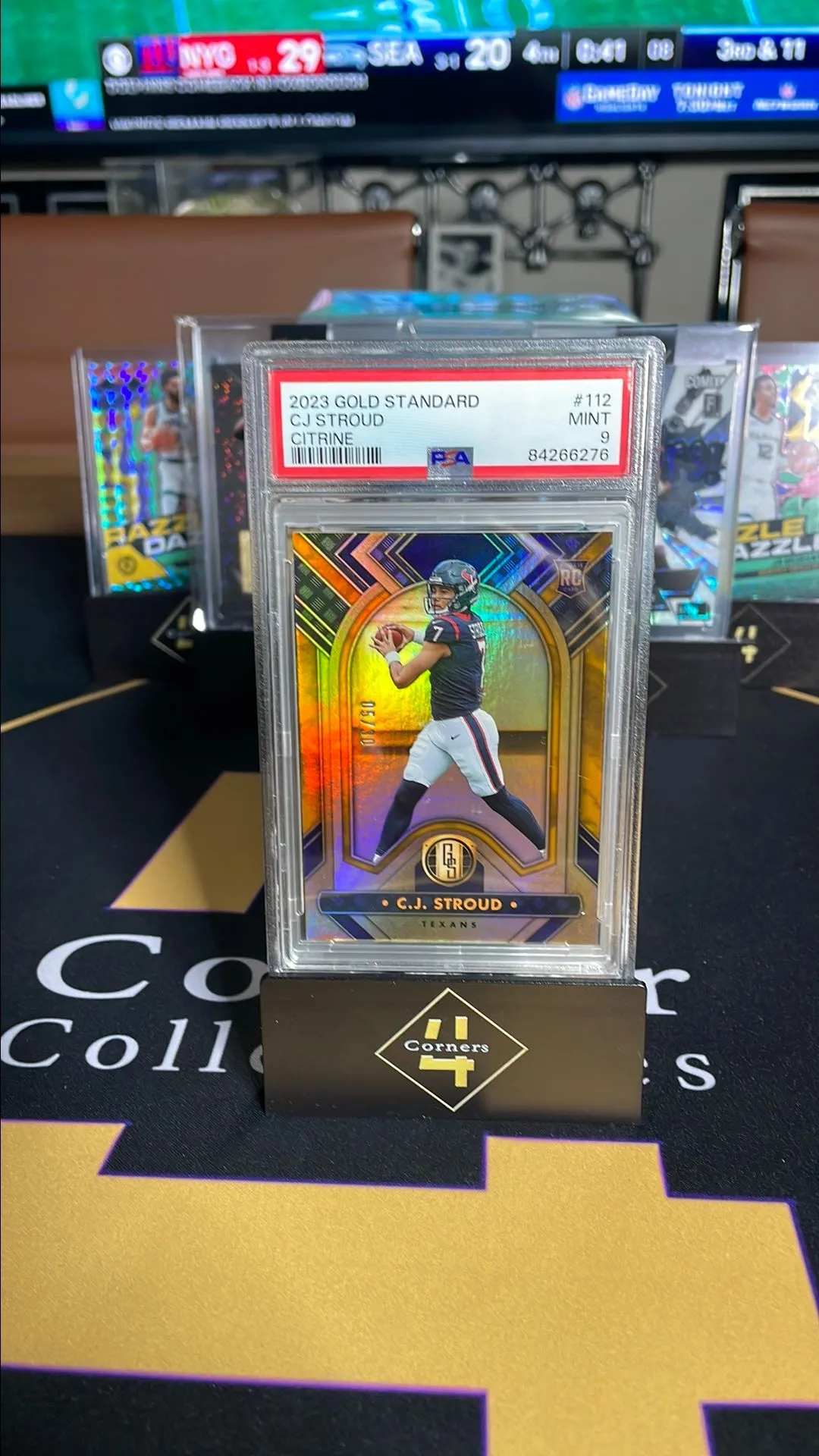 Product image for 2023 Panini Gold Standard Cj Stroud 112 Citrine PSA MINT 9