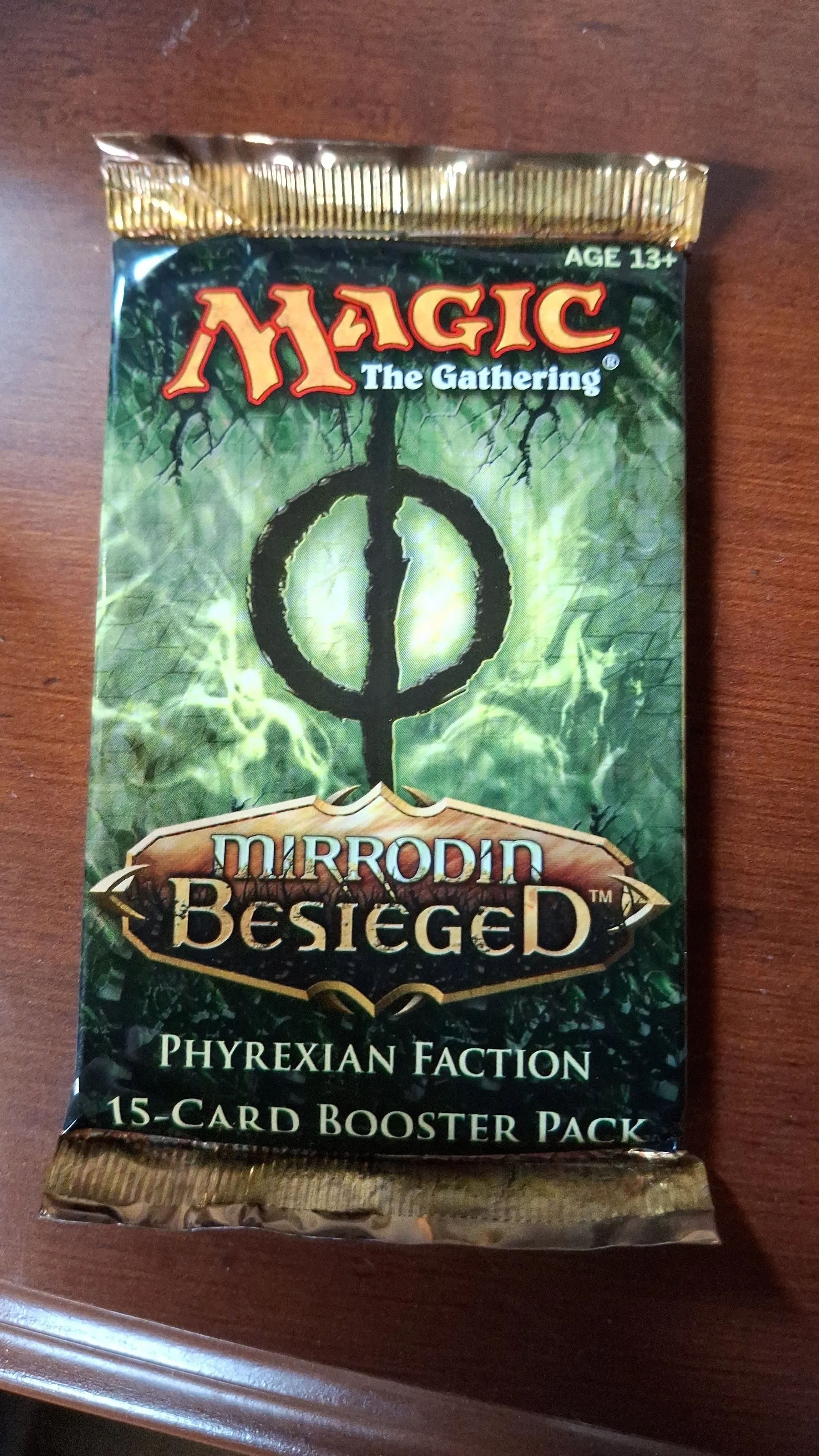 Product image for Mirrodon Besieged prerelease pack Phrexian Faction 