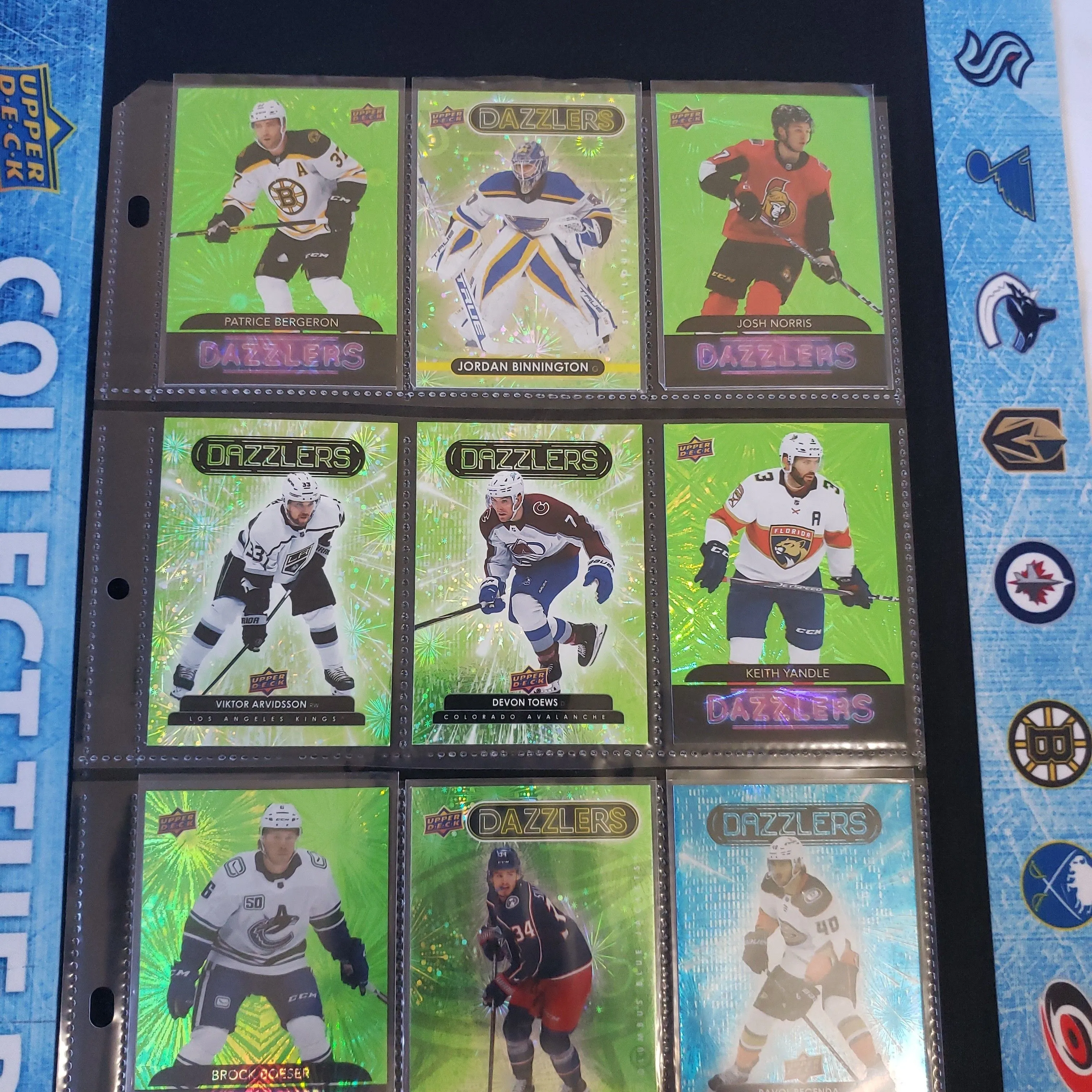 Product image for 9 Card Dealer Sheet #89 Assorted Dazzlers Bergeron Binnington Norris Arvidsson Toews Yandle Boeser Sillinger Regenda (Hockey)