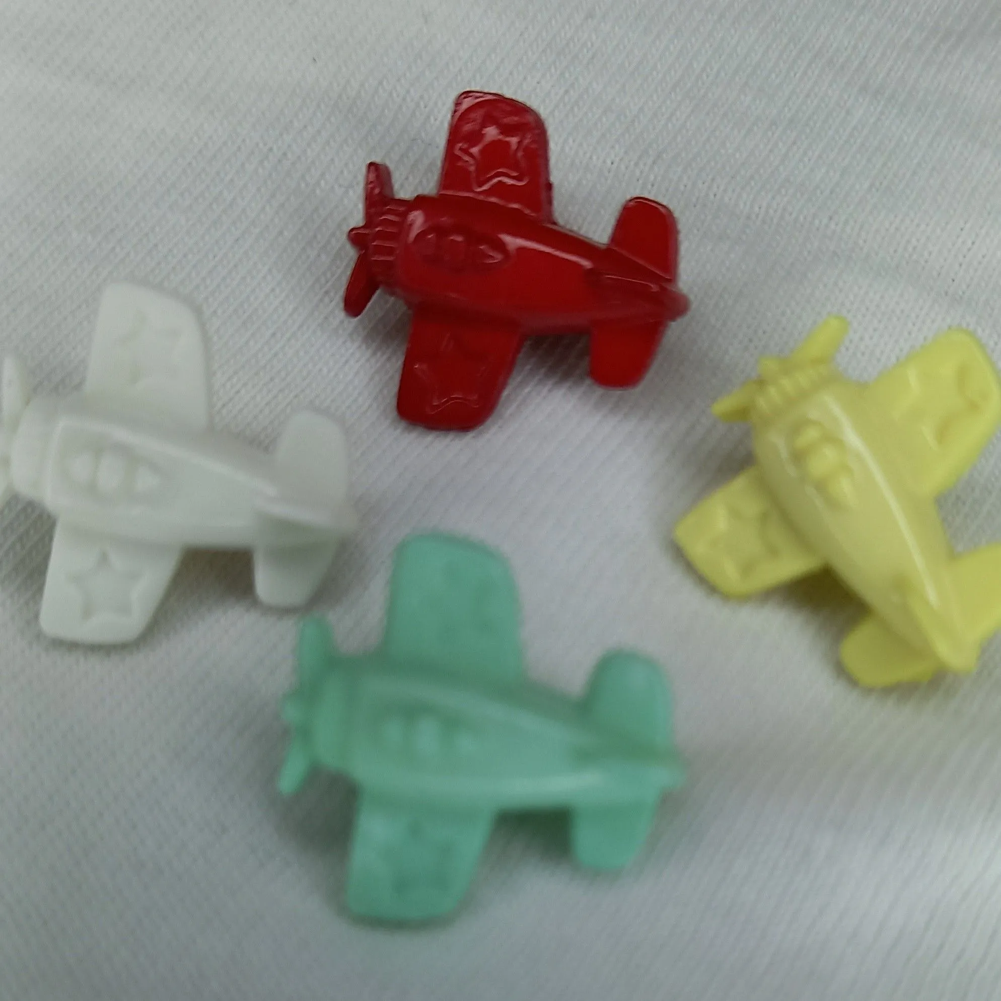 Product image for 5 Yellow Aeroplane Shape Shank Buttons