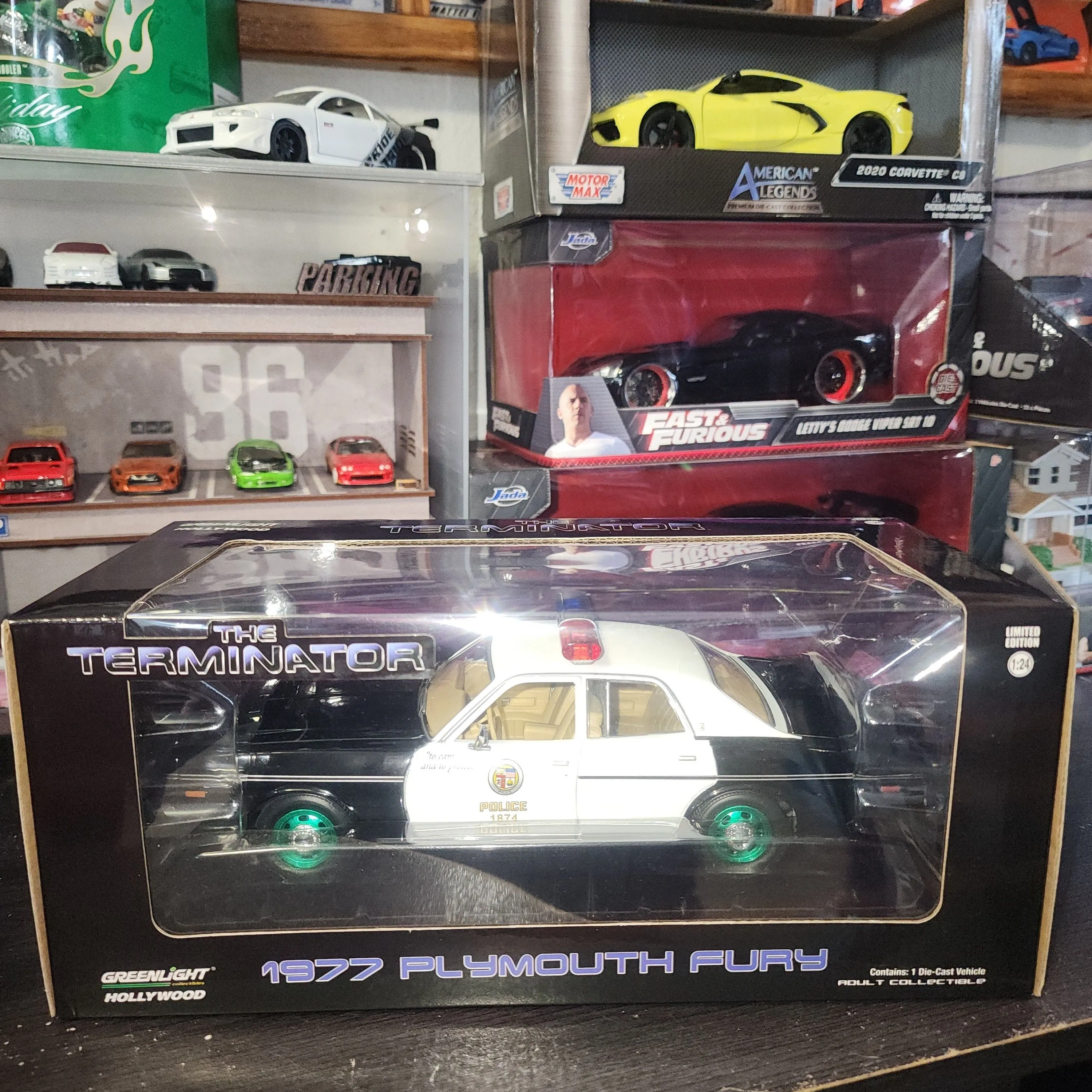 Product image for Greenlight Green Machine Chase 1977 Plymouth Fury Terminator 1:24