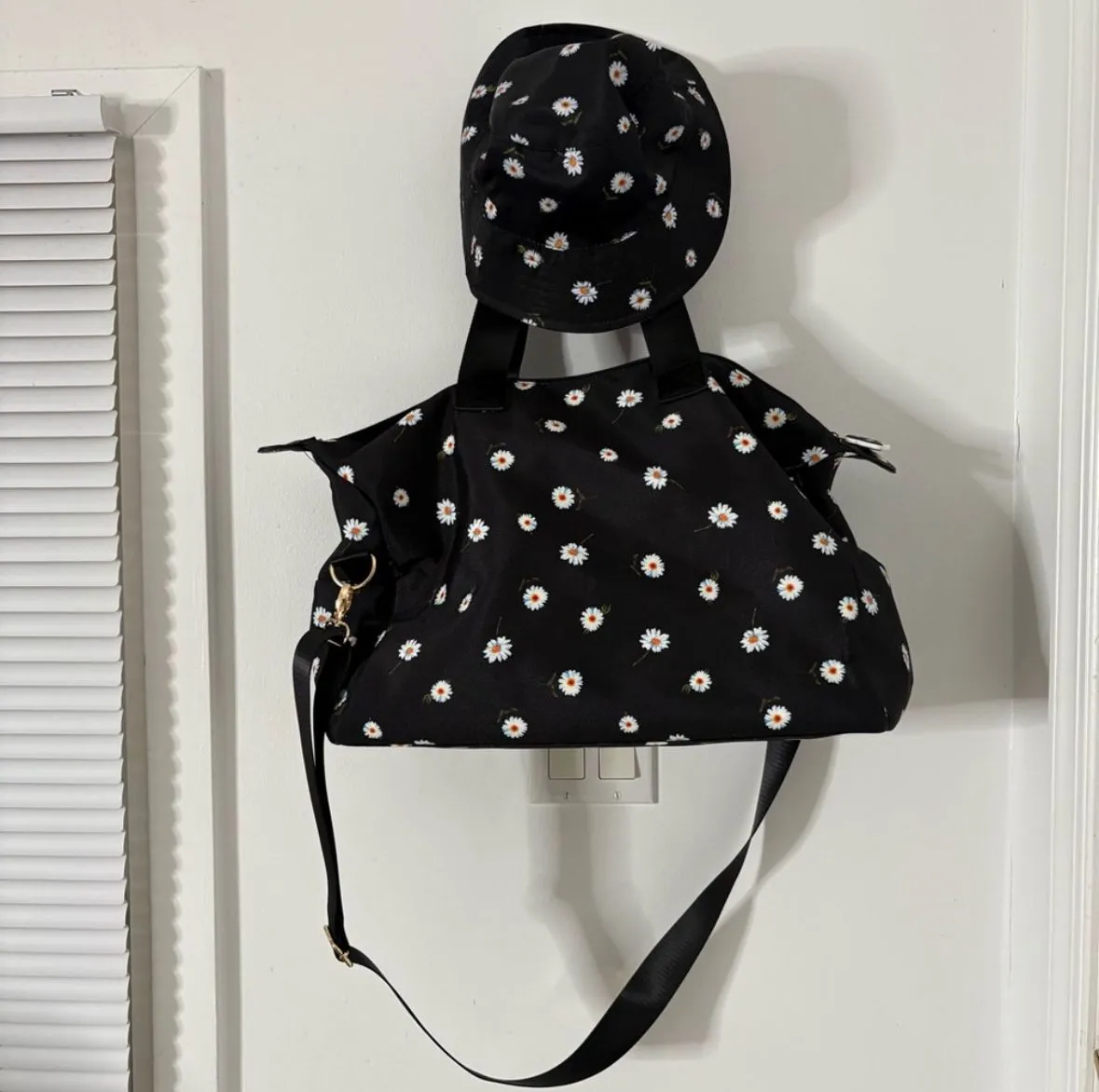 Product image for Alice+Olivia Reversible Bucket Hat and matching Duffle Bag