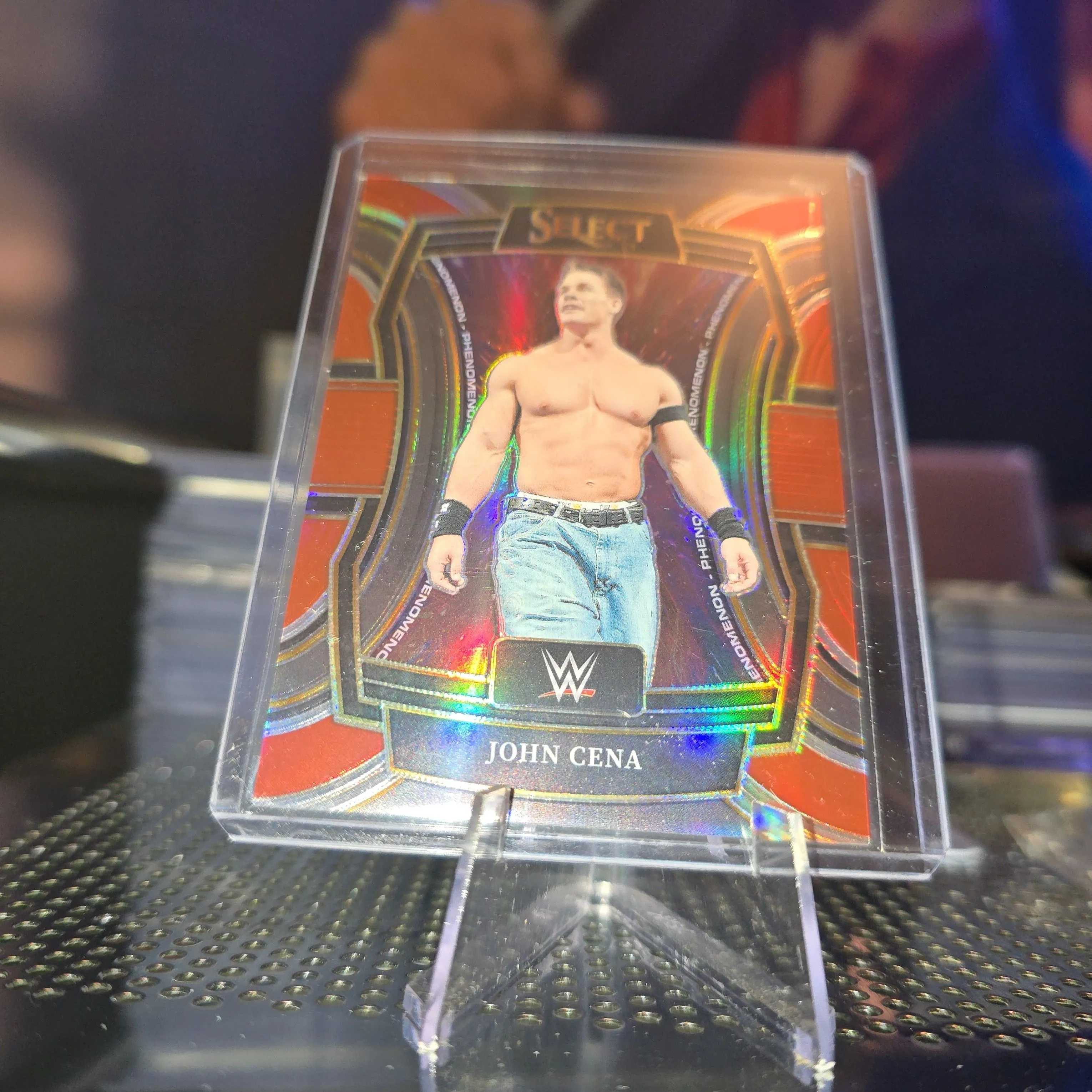 Product image for 2024 Panini Select WWE Phenomenon Red Prizm /99 John Cena #29
