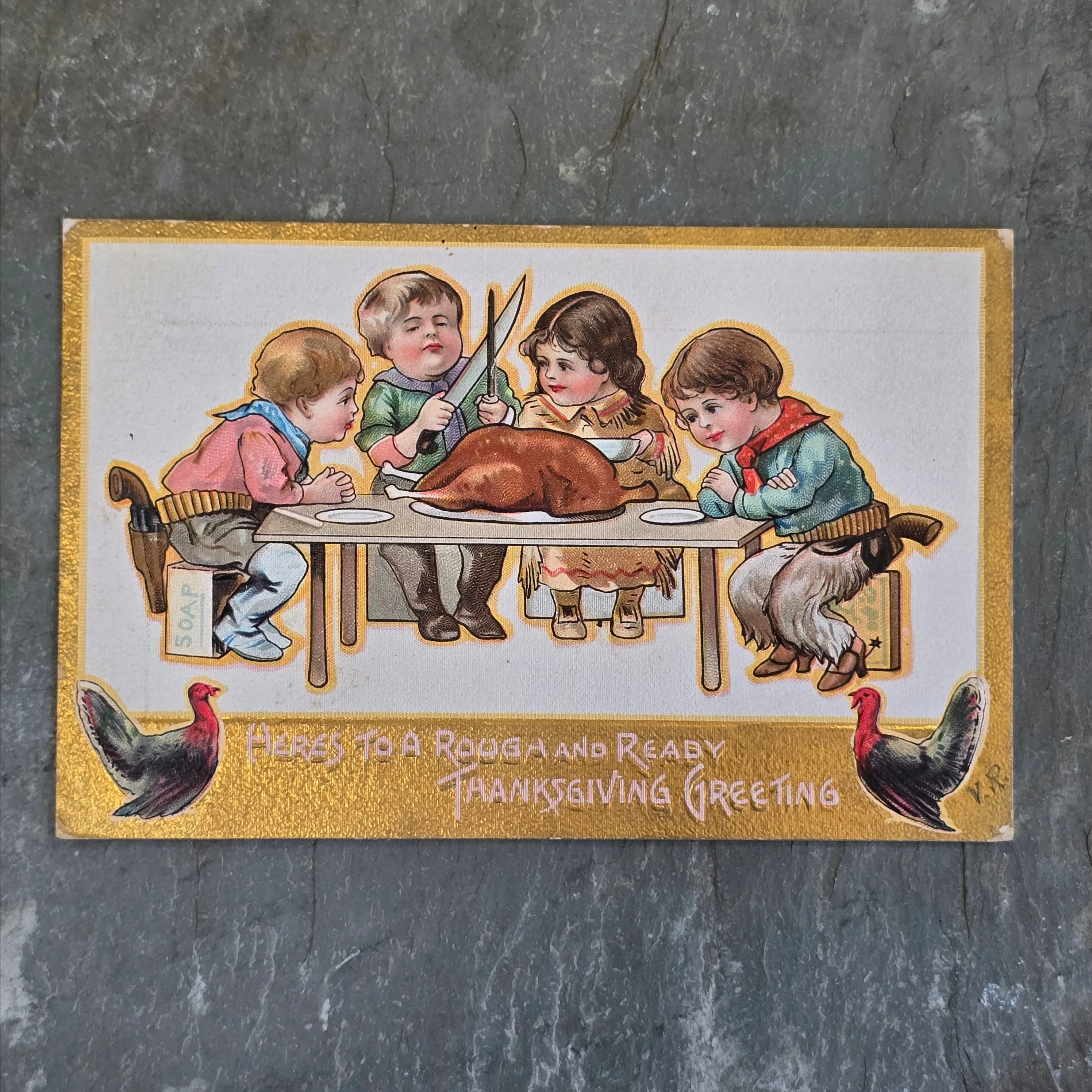 Product image for Antique Embossed Thanksgiving Greeting Postcard Kids at Table w/ Turkey Cap Guns (WNB1-65)
