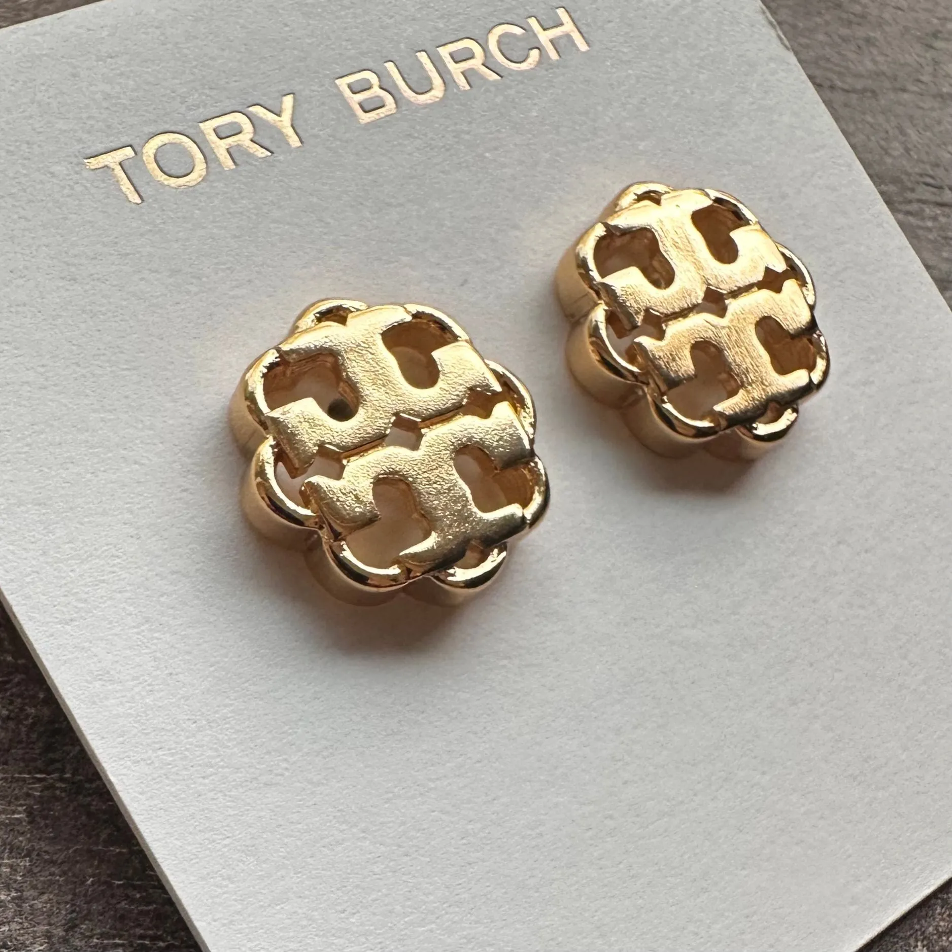 Product image for New Tory Burch Gold Logo Stud Earring on TB Warring Card