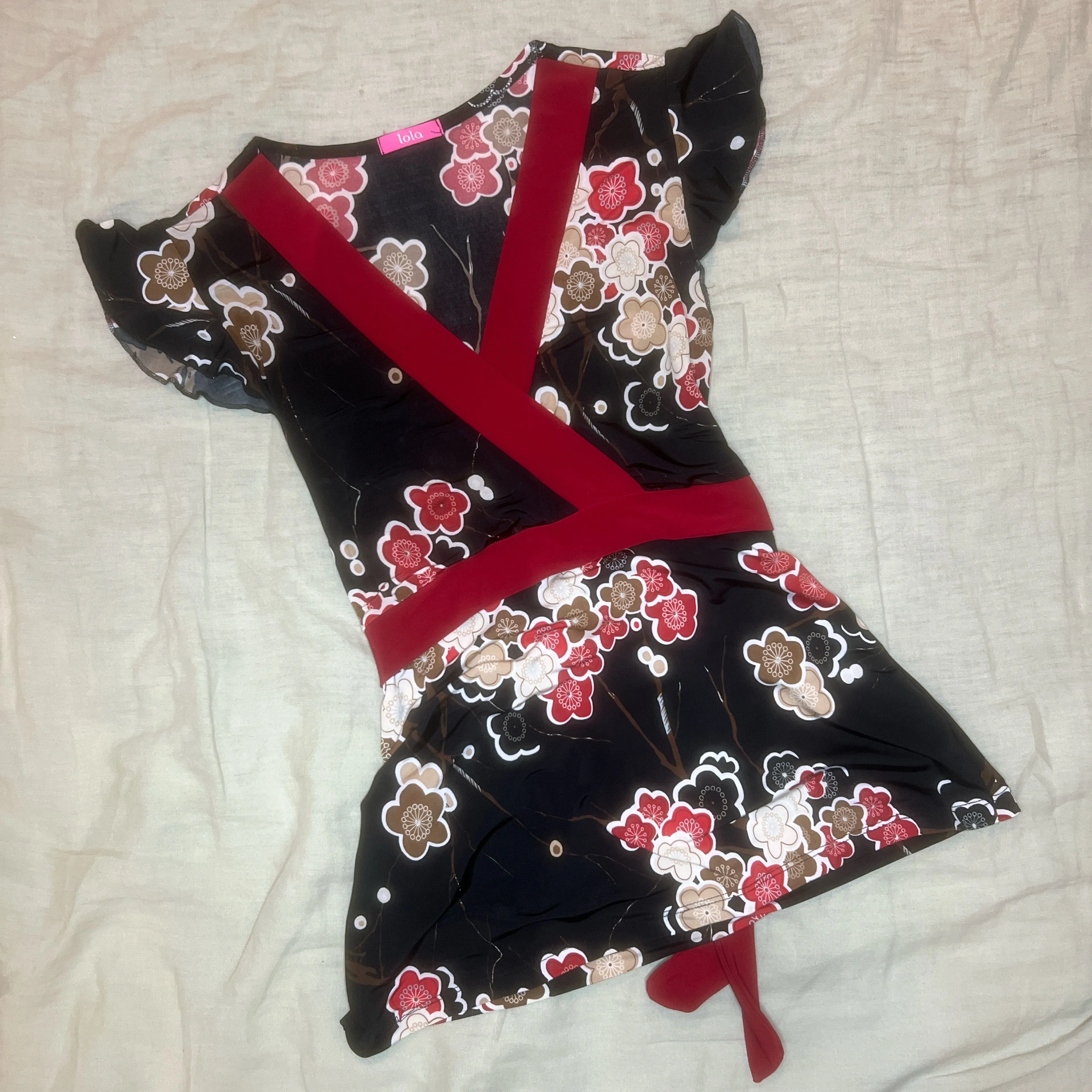 Product image for black/red floral wrap top