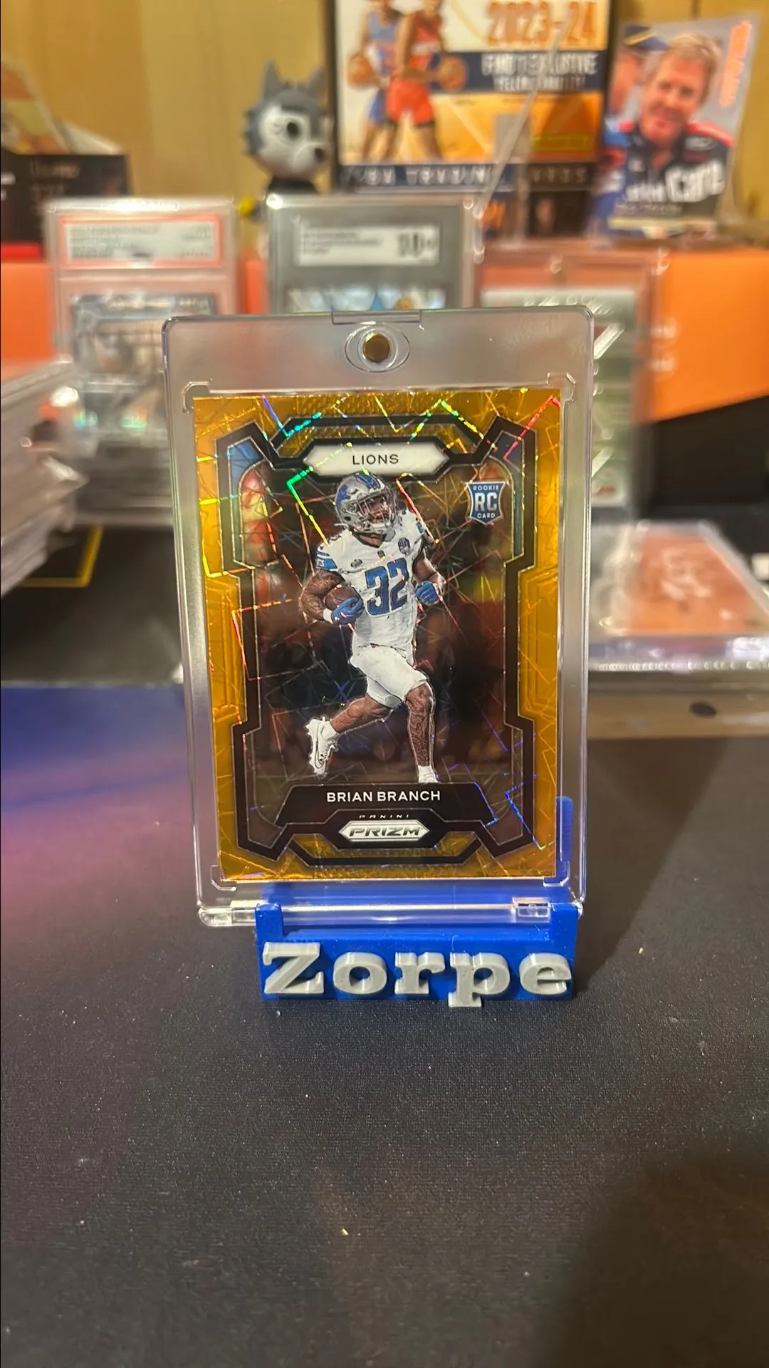 Product image for Brian Branch 2023 Panini Prizm #328 ROOKIE RC ORANGE LASER SP DETROIT LIONS