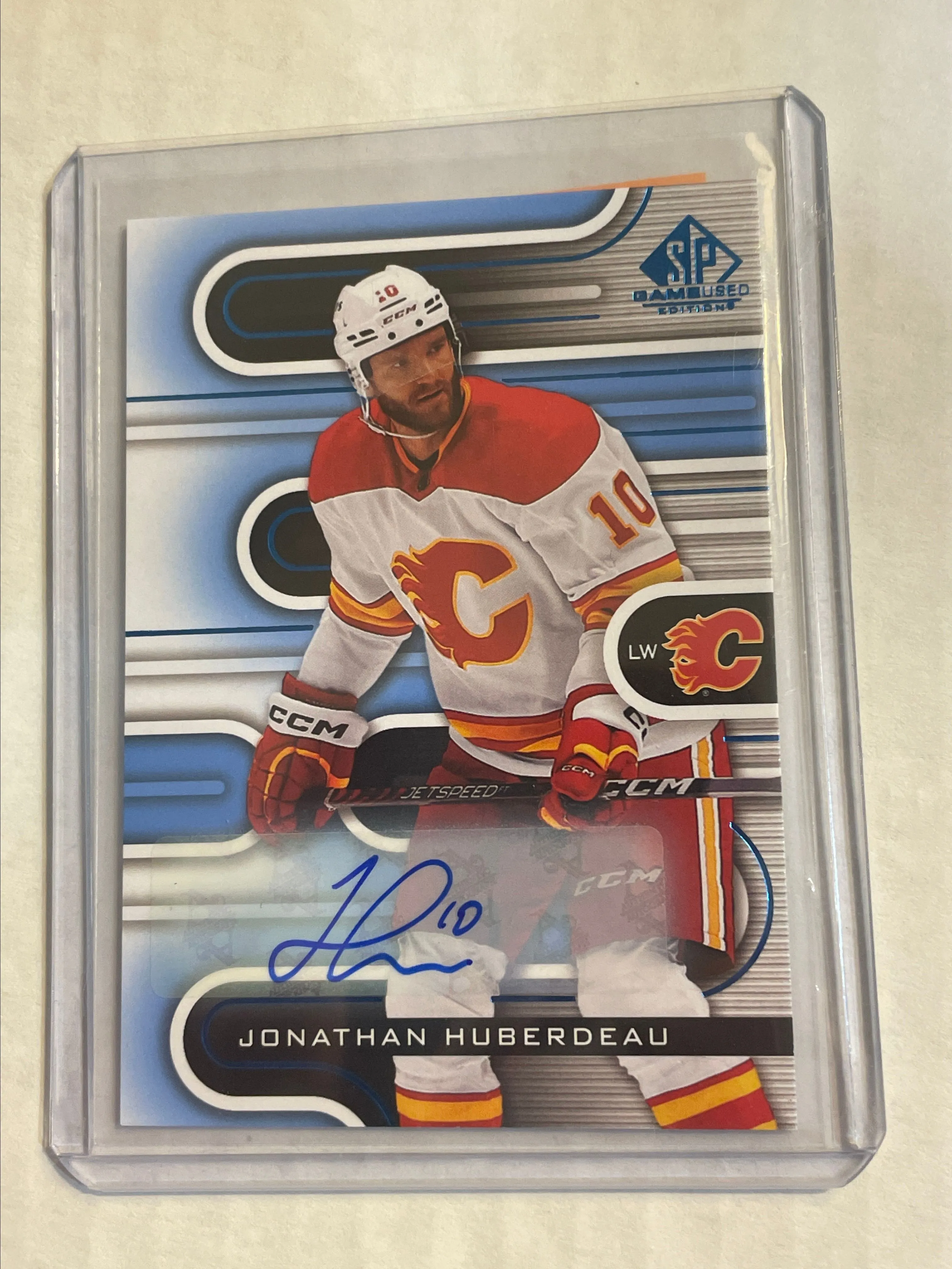 Product image for Jonathan Huberdeau - Calgary Flames - 2022-23 SP Game Used Auto (81)