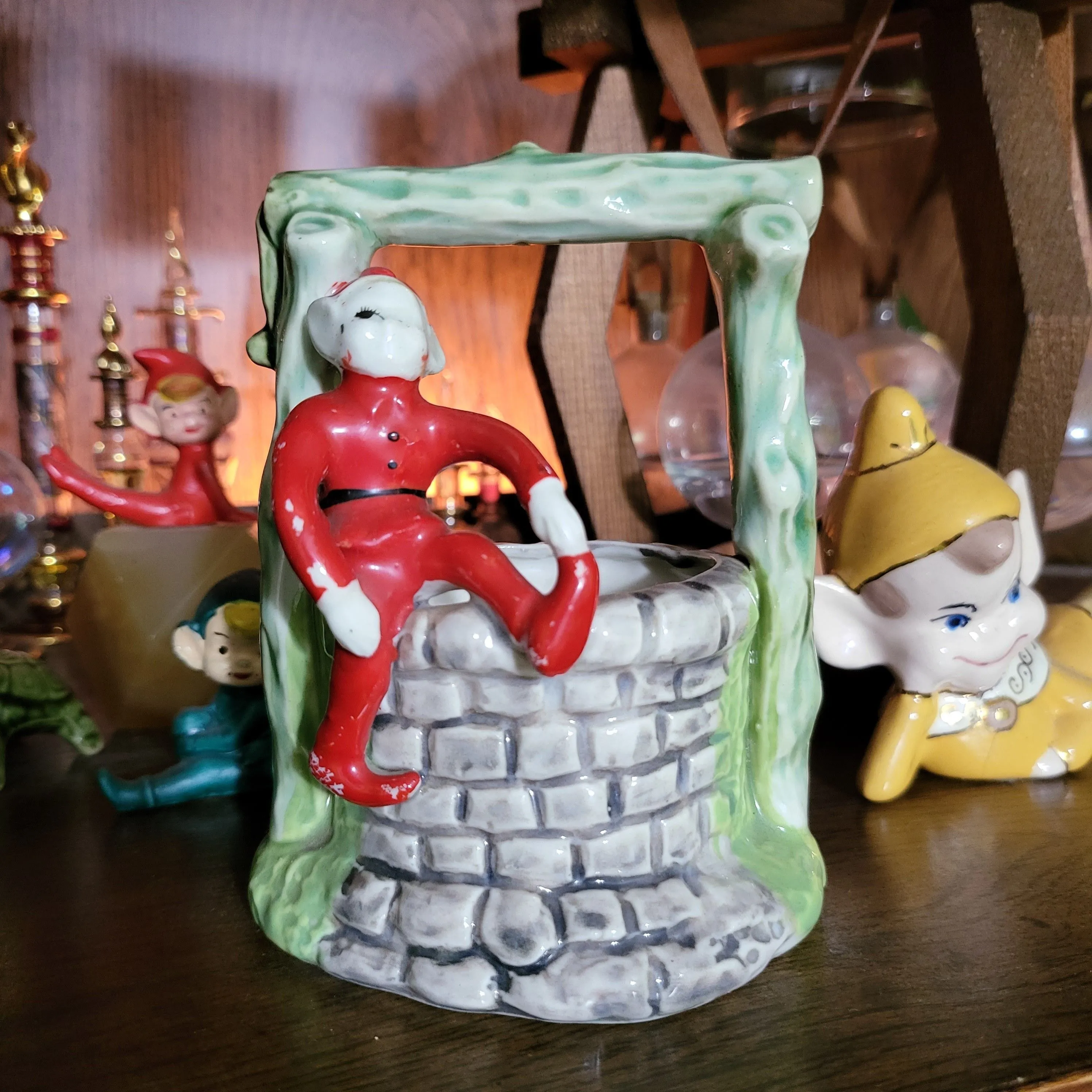 Product image for vintage Ceramic elf on well planter