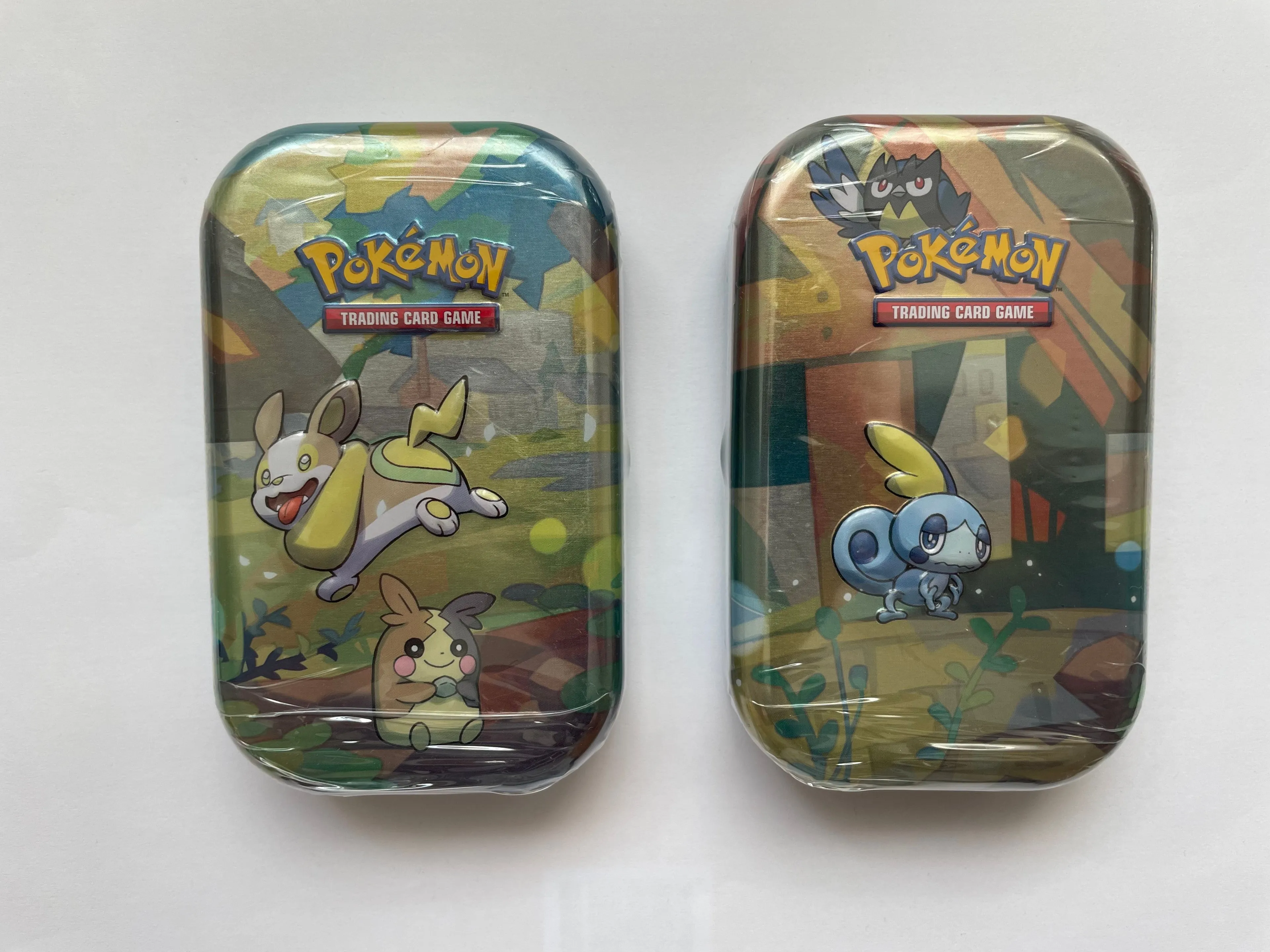 pokémon trading card game galar pals mini tin Prismatic Evolutions Mini Tin – Phantom Card Shop