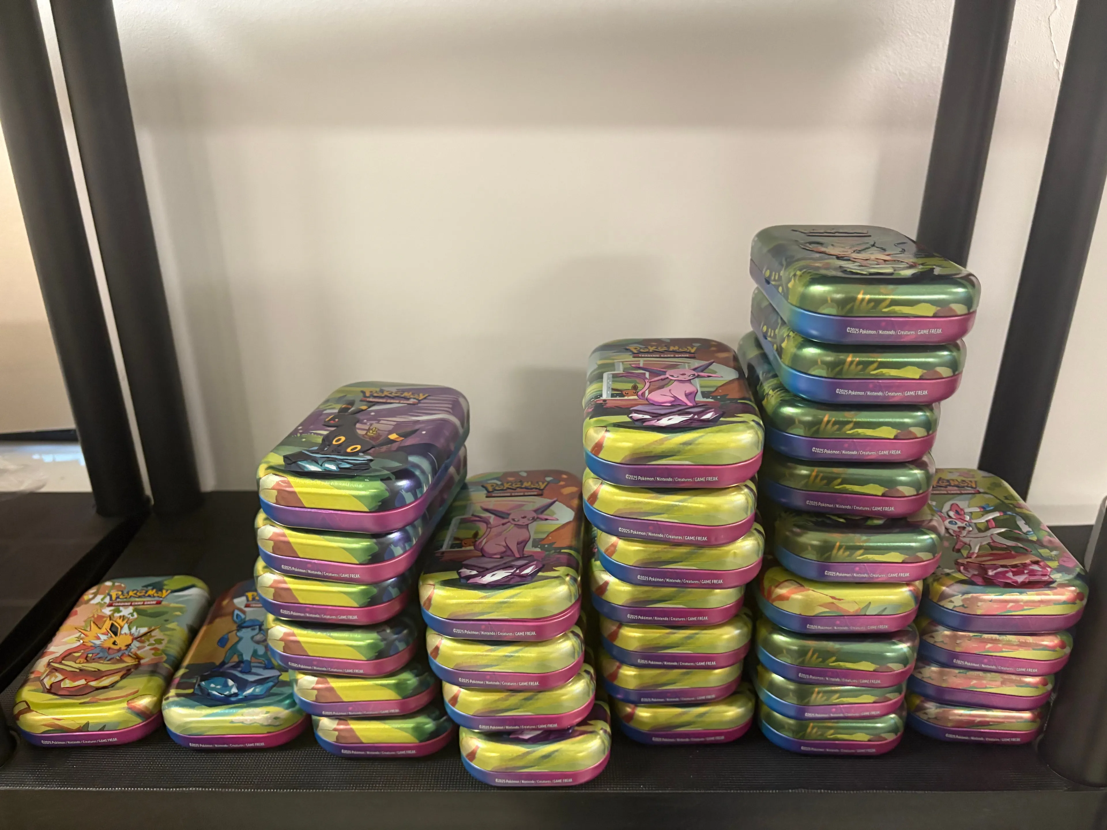 Product image for Pokemon Prismatic Evolutions Mini Tins x32 EMPTY No Packs, Only Art Cards & Coin