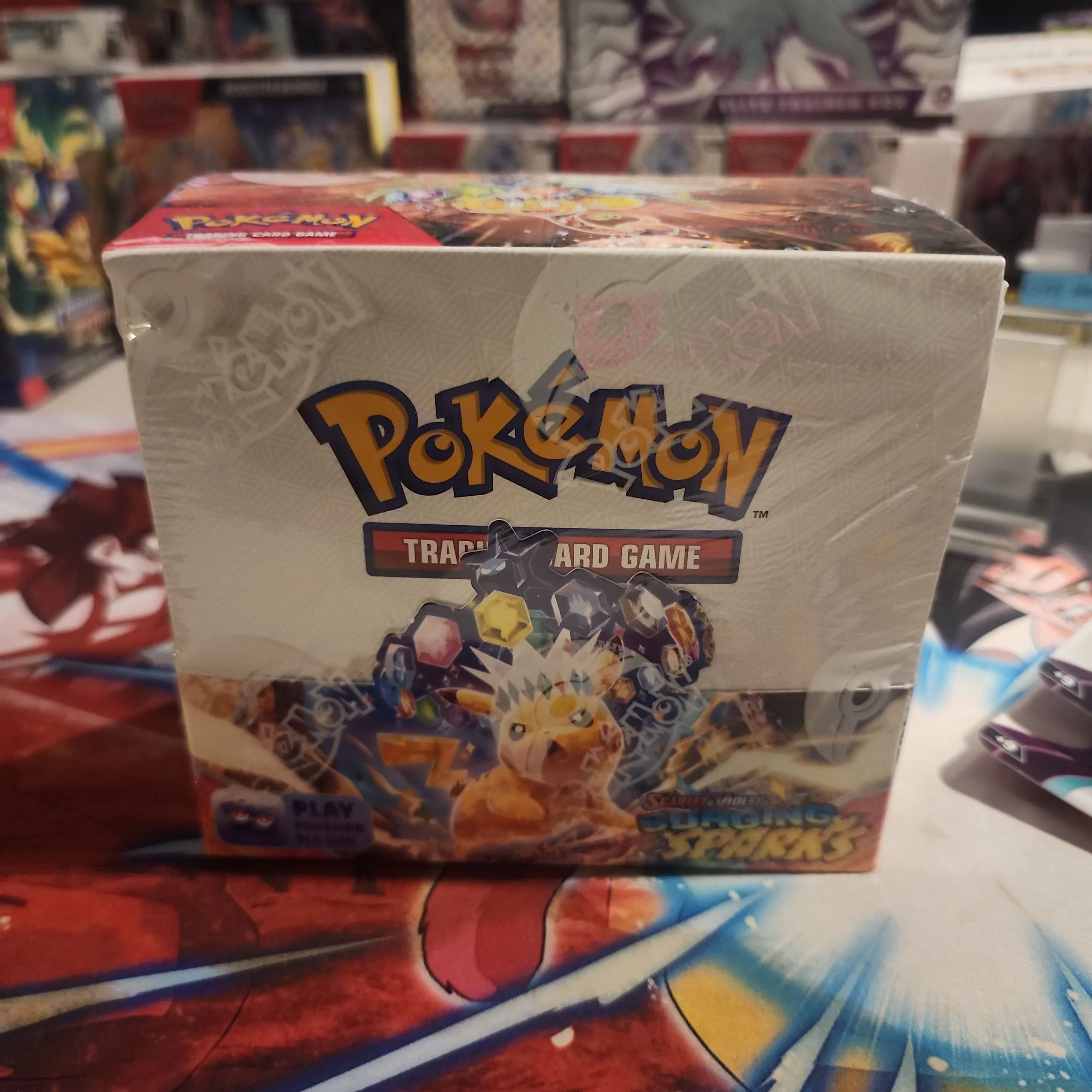 Product image for surging sparks booster box ship sealed 