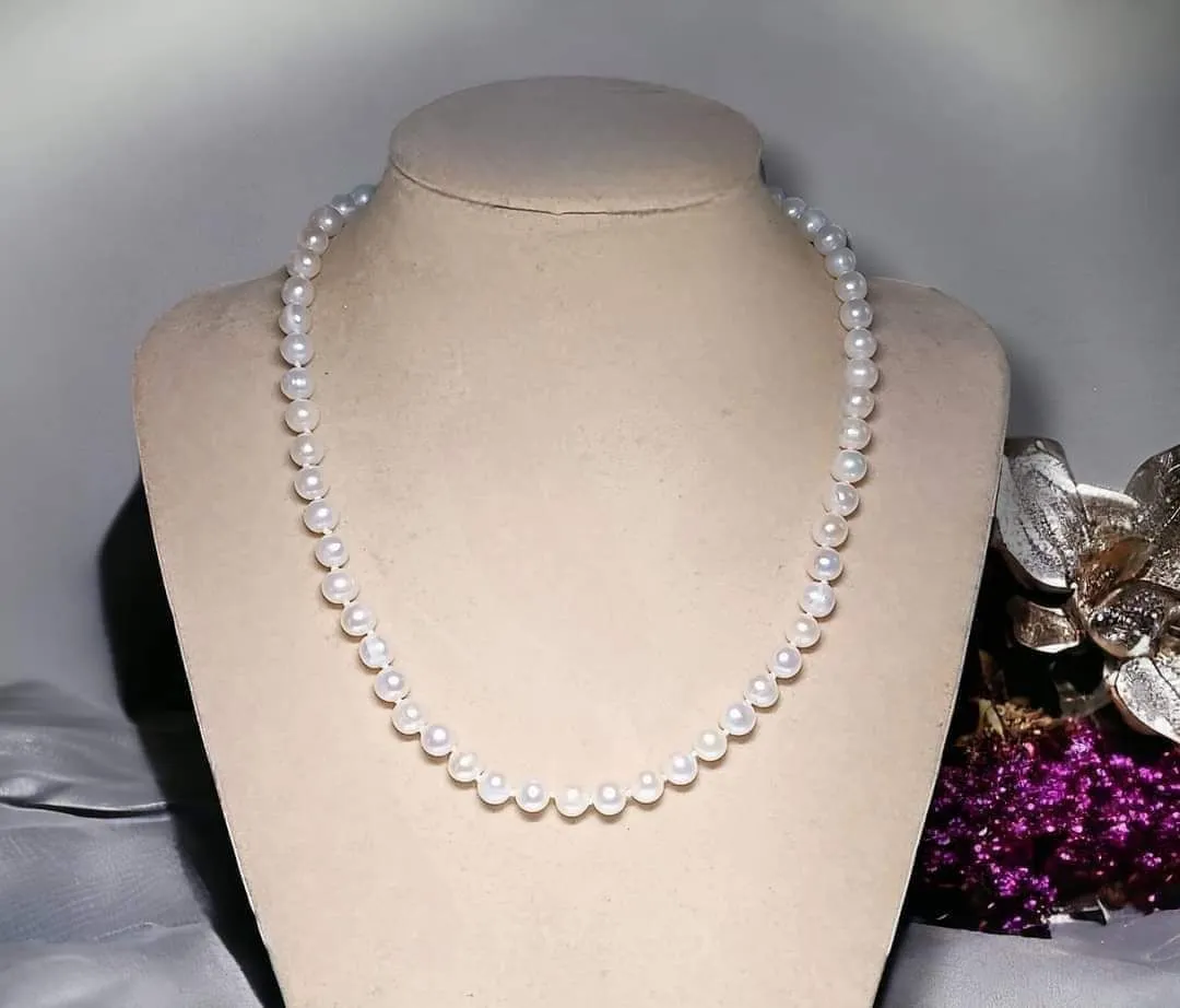 Product image for Sterling 6mm-7mm freshwater pearl beaded knotted 16"-18" necklace. Necklace is stamped .925 and test
