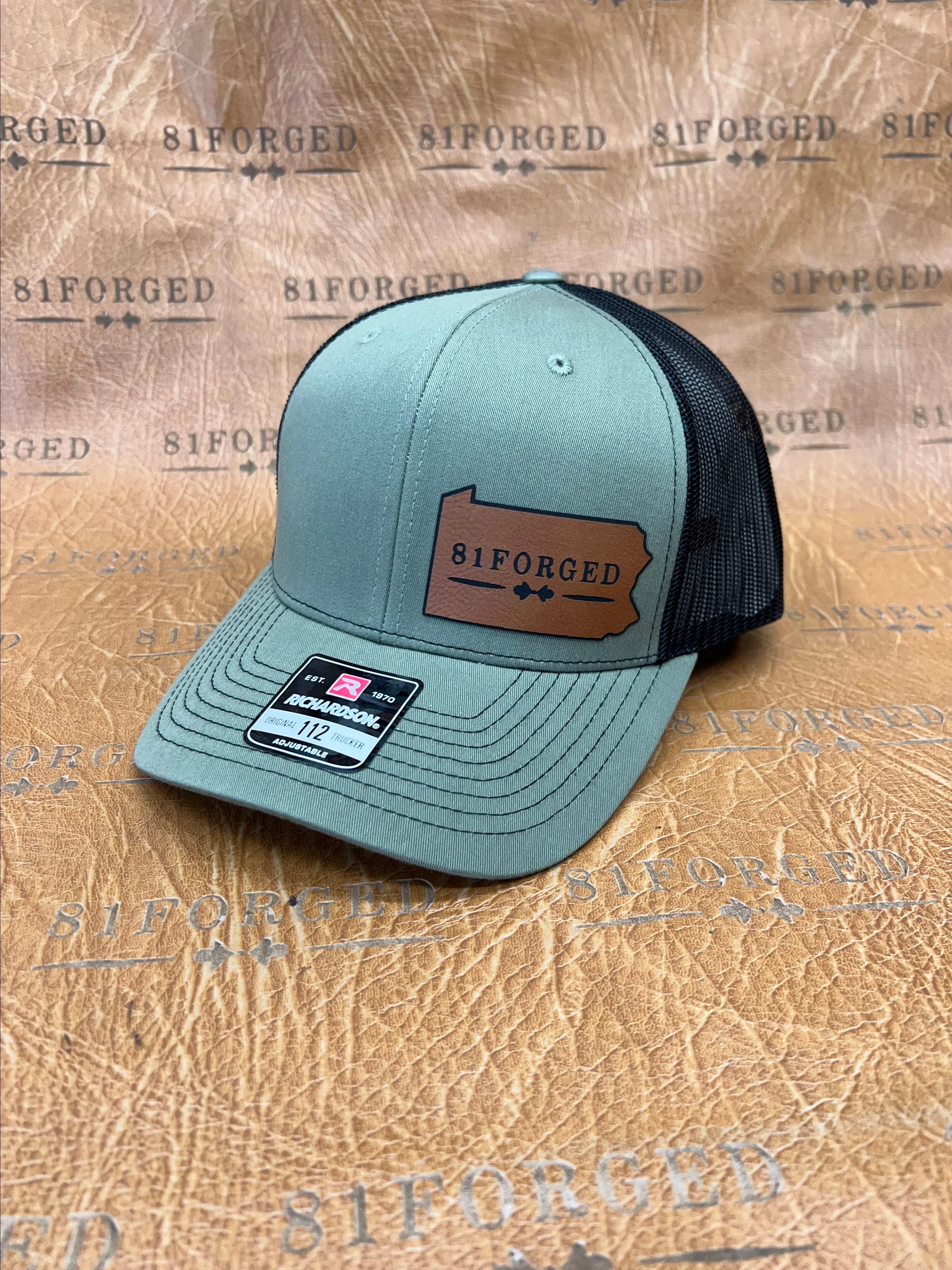 Product image for Green Richardson 112 leather patch hat with the 81Forged Logo.