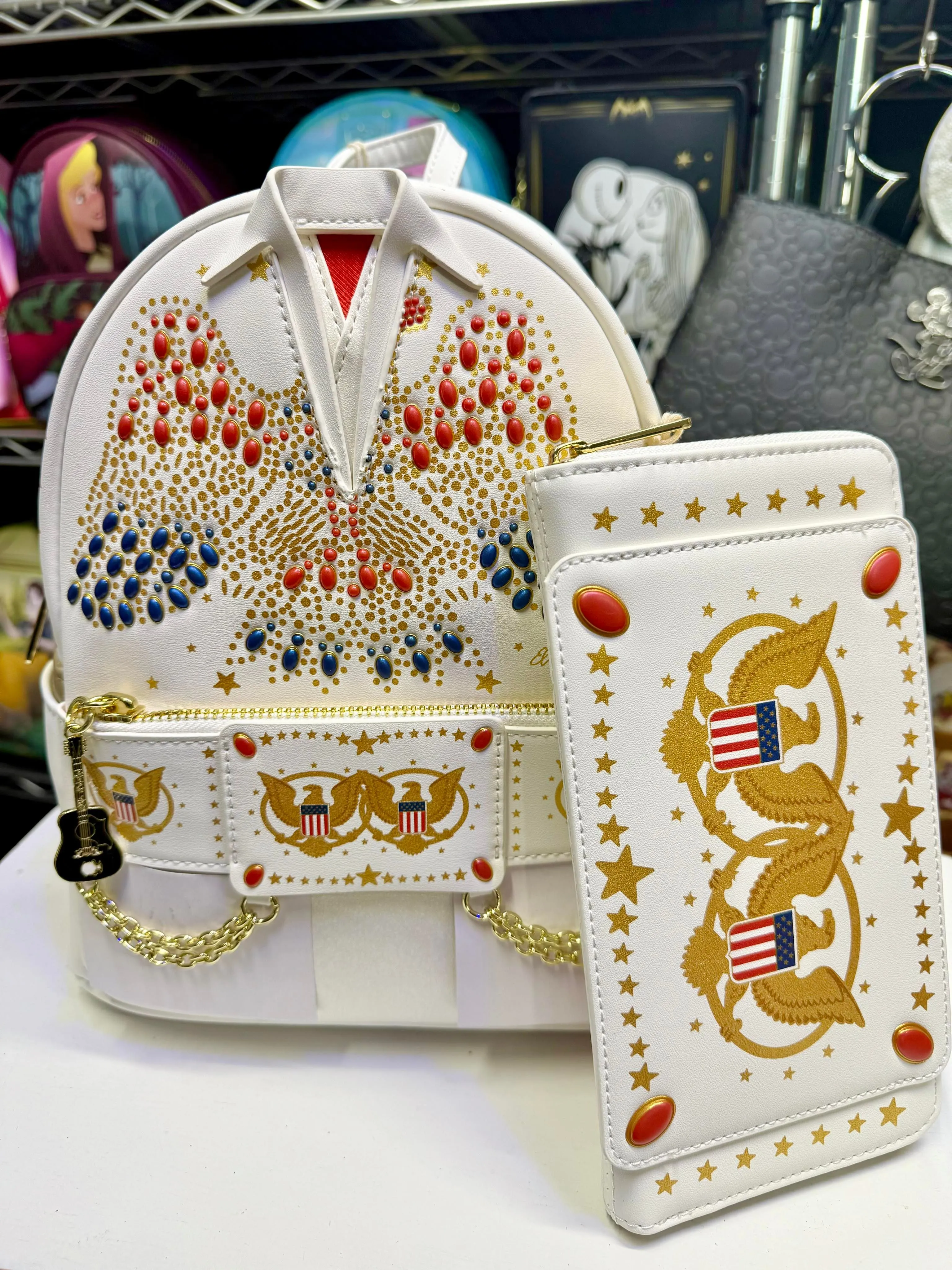 Product image for B. NEW ARRIVAL; Loungefly Elvis Presley Aloha Jumpsuit Cosplay Mini Backpack & Wallet (Exclusive)