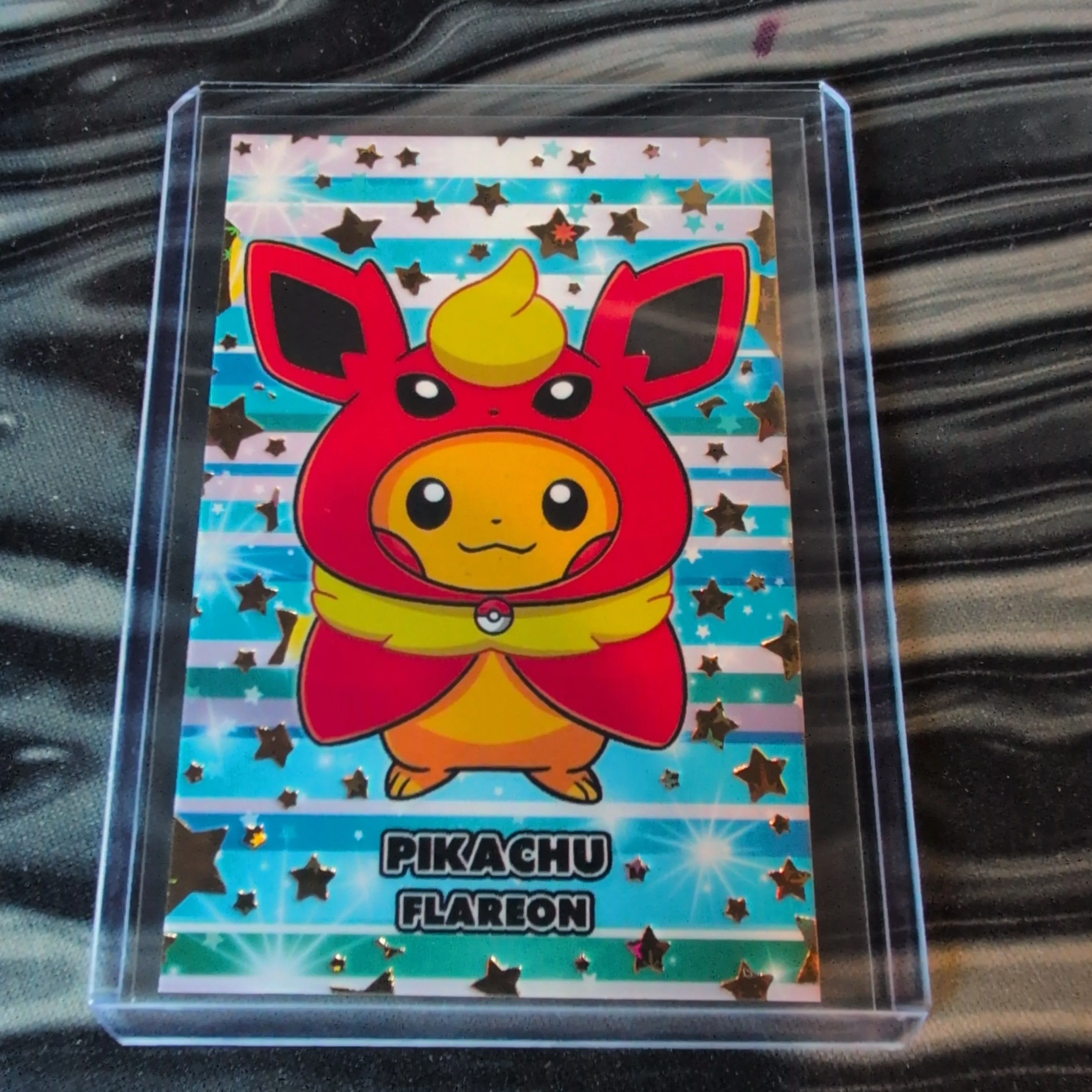 Product image for GOLD STAR HOLO Pikachu poncho FLAREON 